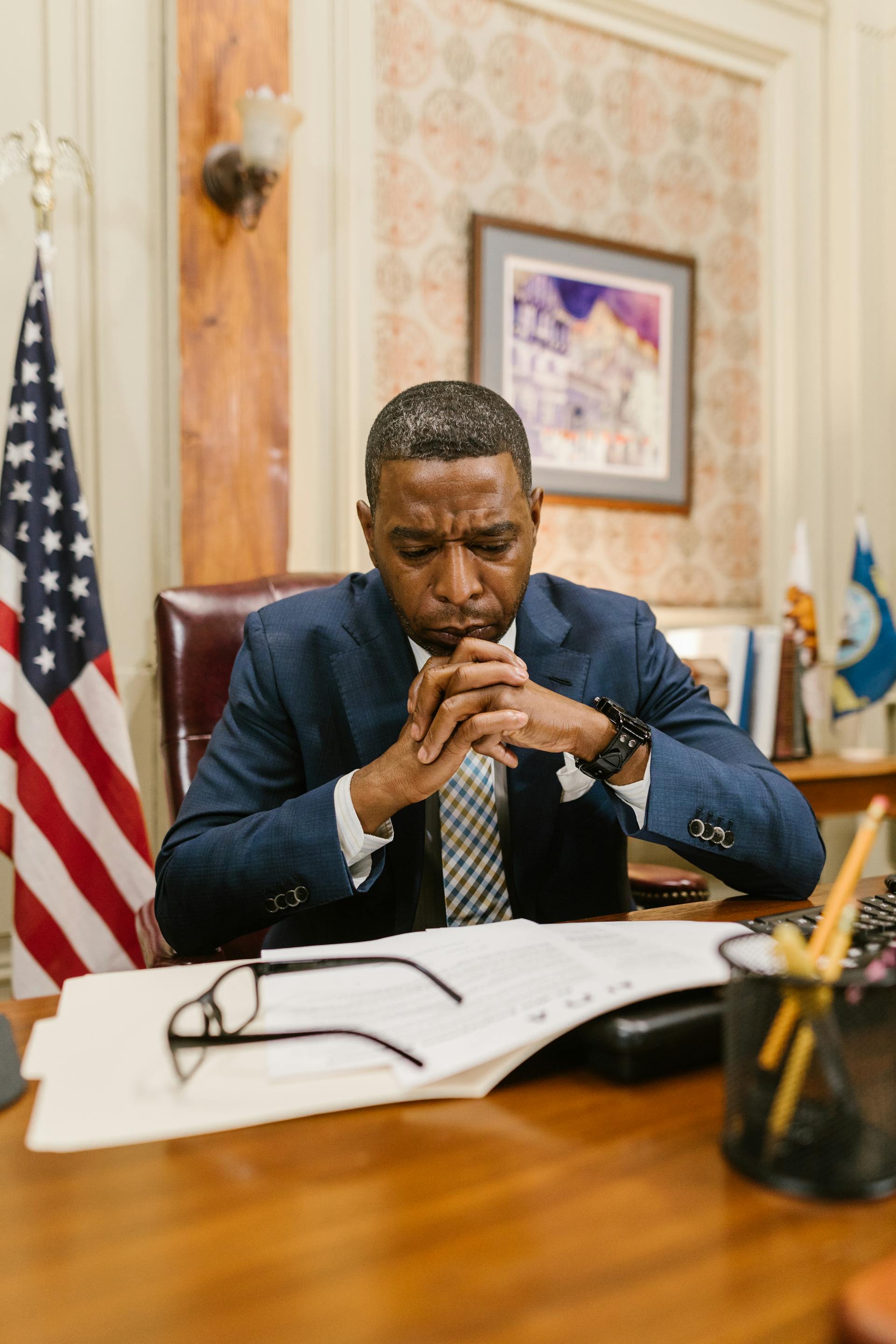 A lawyer sitting at his desk | Source: Pexels