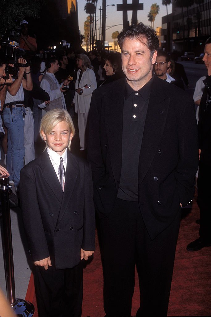 John Travolta and son Jett Travolta attending "Phenomenon" premiere in Los Angeles in 1996 | Photo: Getty Images