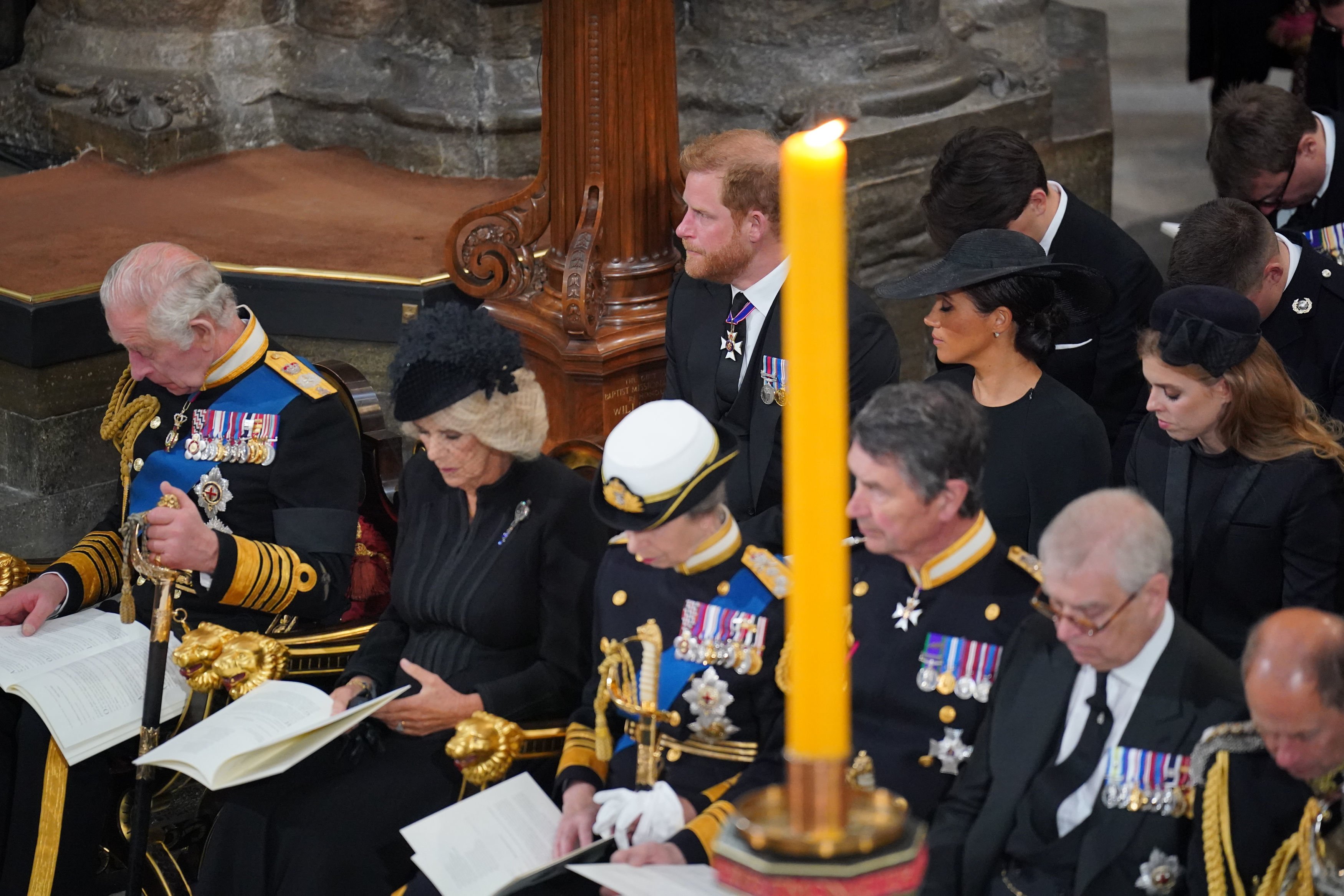 King Charles III, Camilla, Queen Consort, Princess Anne, Princess Royal, Prince Harry, Duke of Sussex, and Meghan, Duchess of Sussex, during the State Funeral of Queen Elizabeth II at Westminster Abbey on September 19, 2022, in London, England. | Source: Getty Images