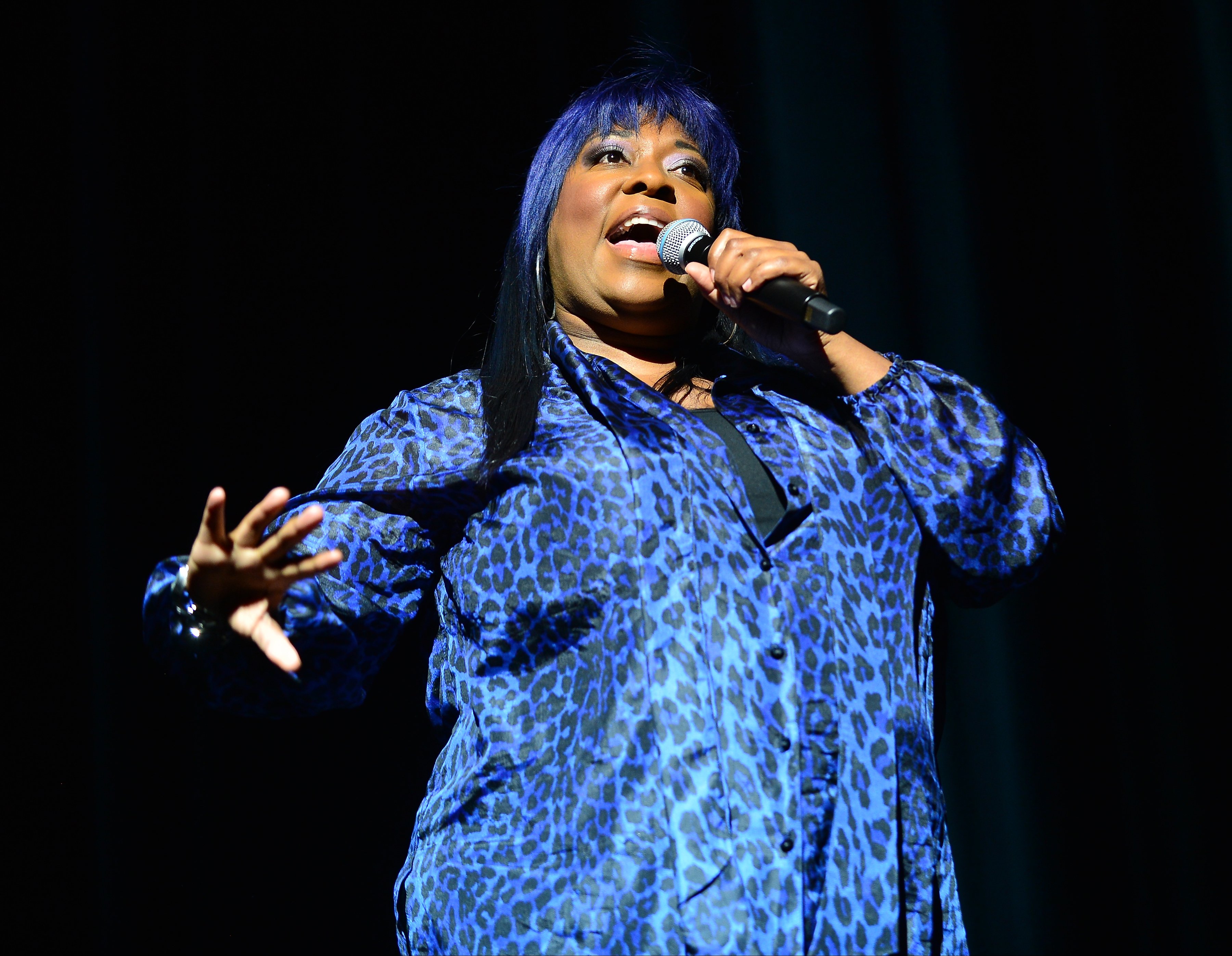  Comedian Loni Love performs during the 8th Annual Memorial Day Weekend Comedy Festival at James L Knight Center | Photo: Getty Images