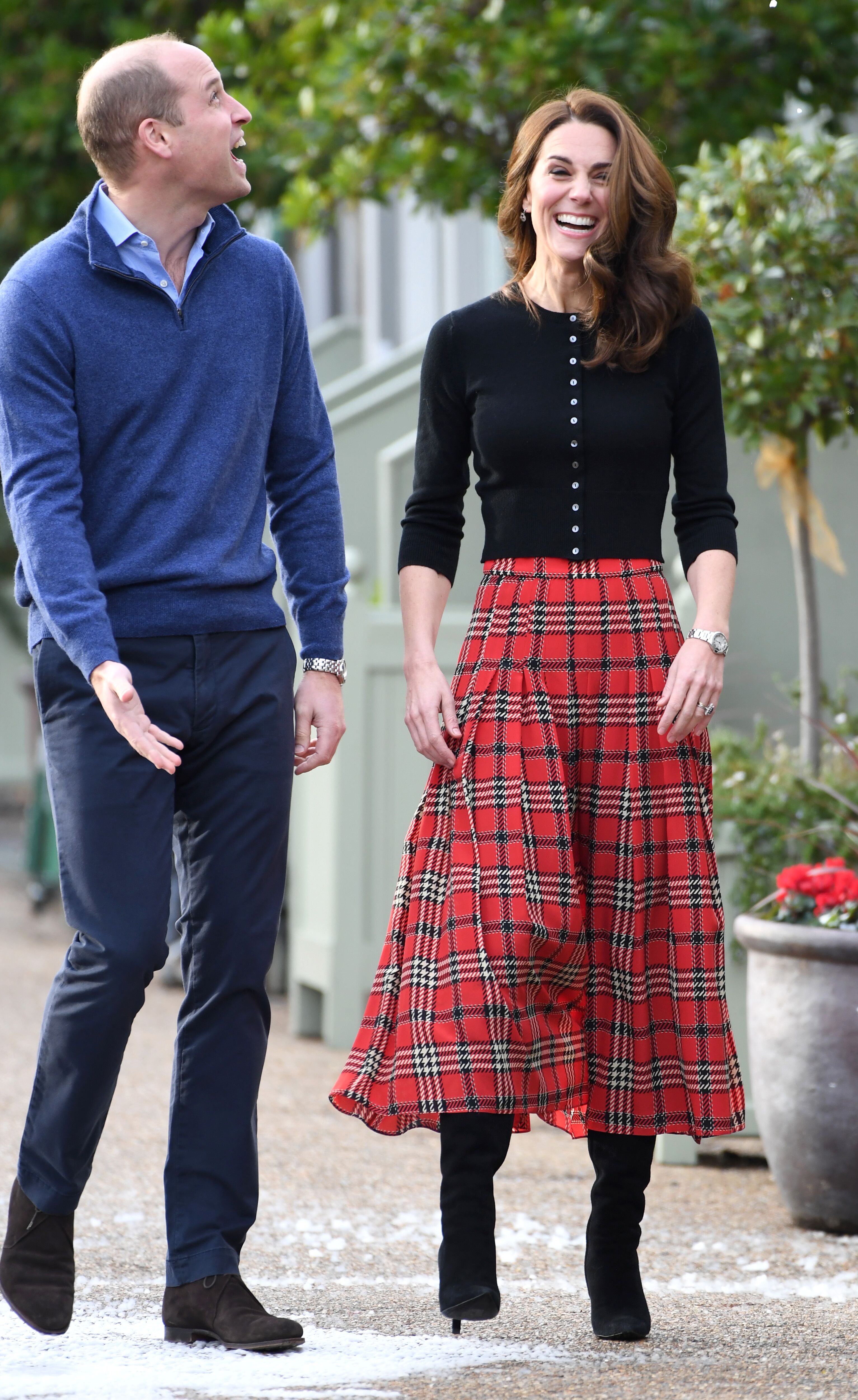 Duke and Duchess of Cambridge laugh as a machine sprays snow | Getty Images