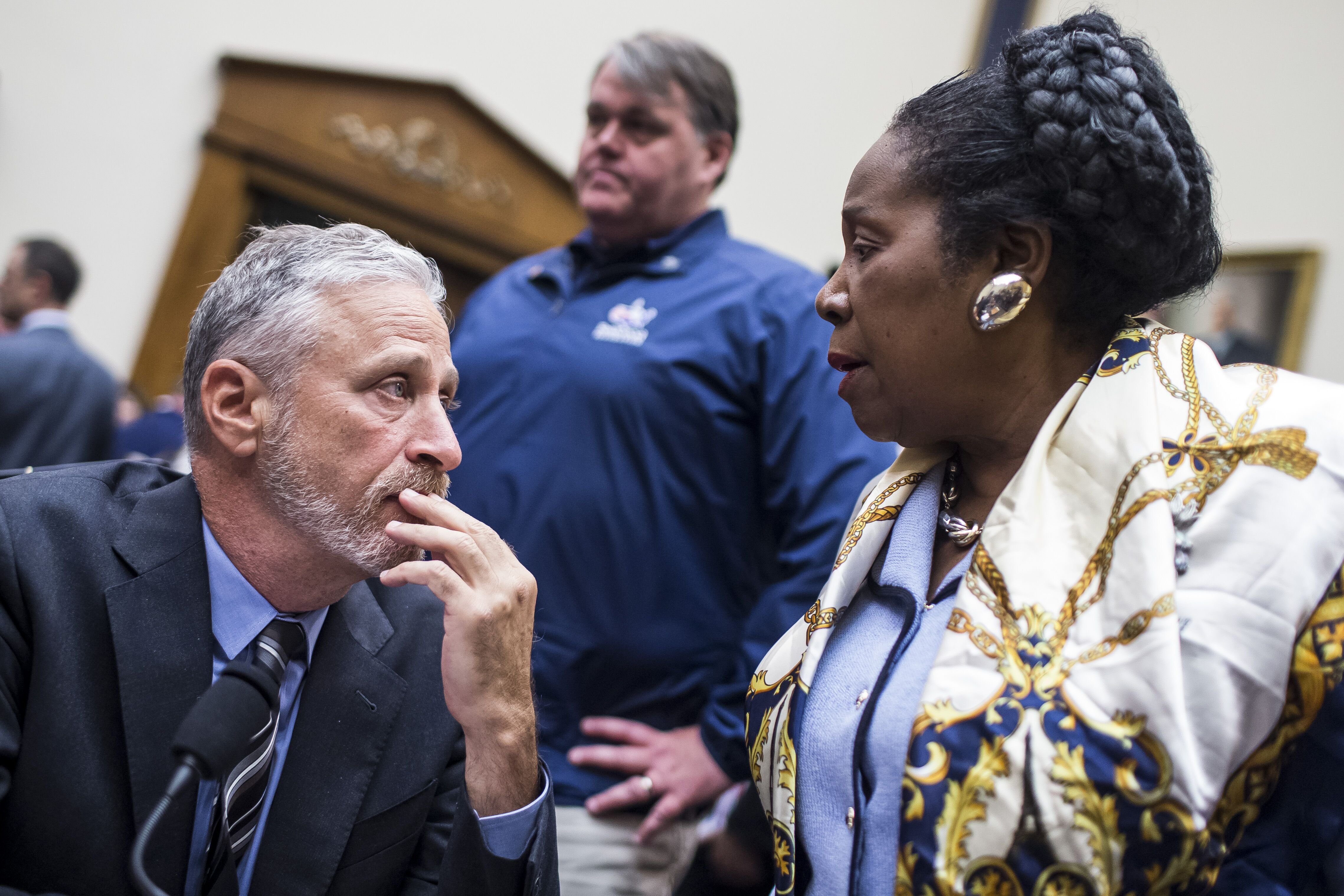 Jon Stewart speaks to Rep. Sheila Jackson Lee (D-TX) on Capitol Hill on June 11, 2019 in Washington, DC. | Source: Getty Images