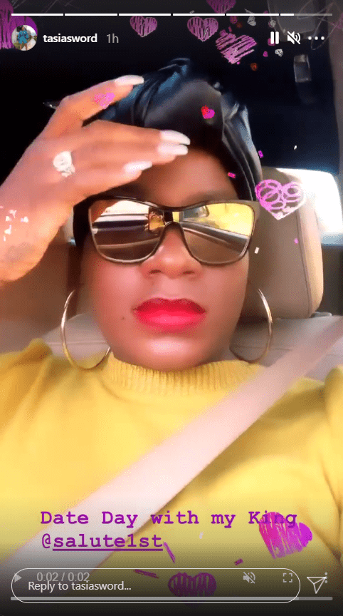 A screenshot of Fantasia Barrino sporting red lipstick as she takes a selfie | Photo: Instagram/tasiasworld