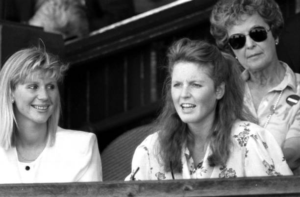 Sarah Ferguson, Duchess of York (R) and her former flat mate Carolyn Cotterell in the Royal Box at Wimbledon in 1999 | Photo: PA Images/Getty Images