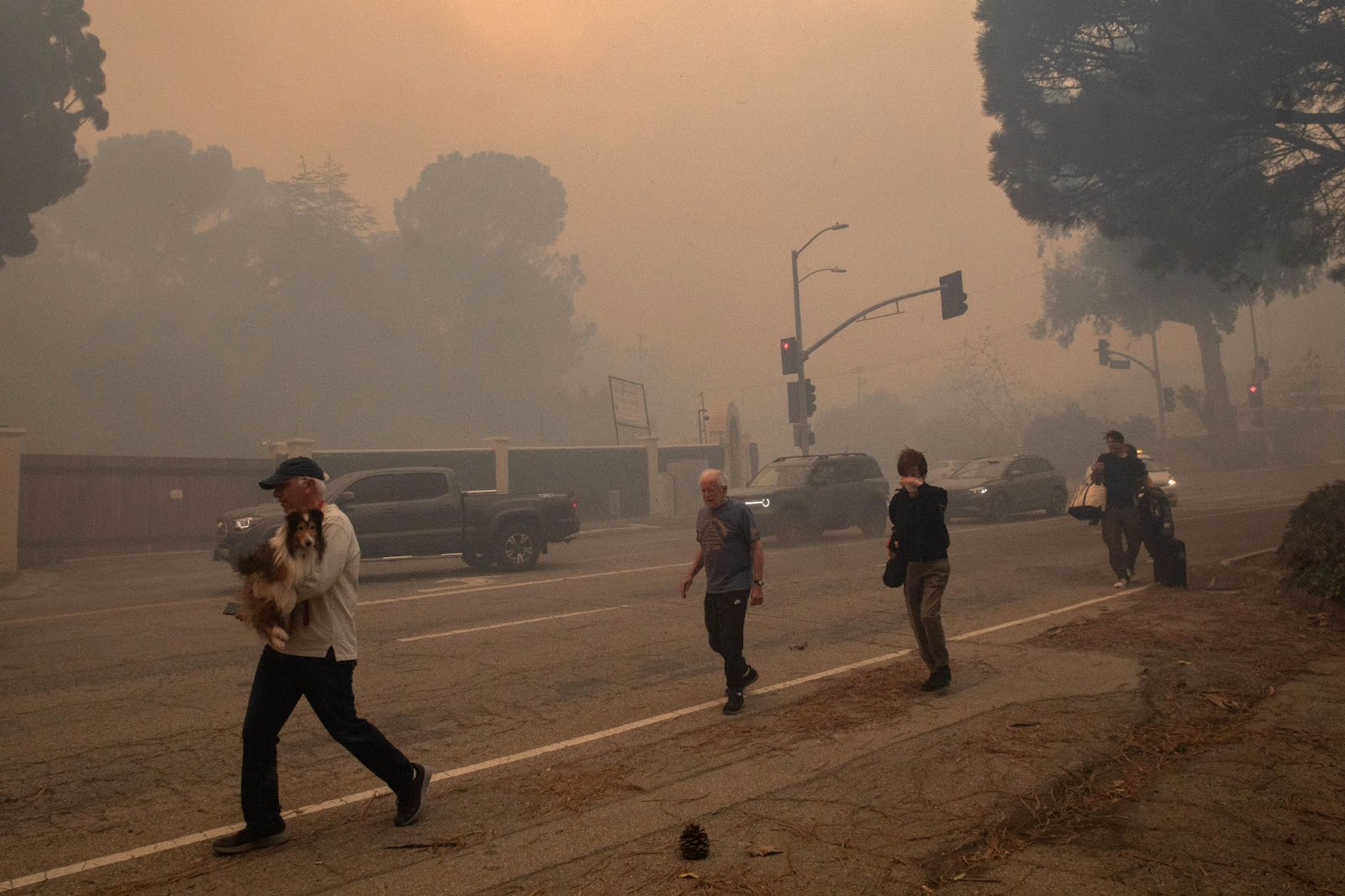 People evacuating during the Palisades Fire on January 7, 2025. | Source: Getty Images