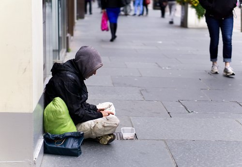 A homeless man begging. | Source: Shutterstock.
