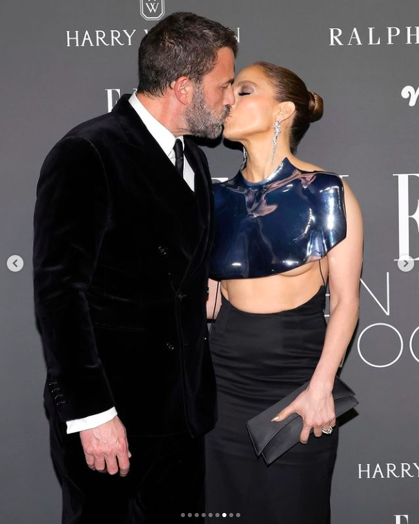 Ben Affleck and Jennifer Lopez sharing a kiss at the Women in Hollywood event posted on December 6, 2023 | Source: Instagram/jlo
