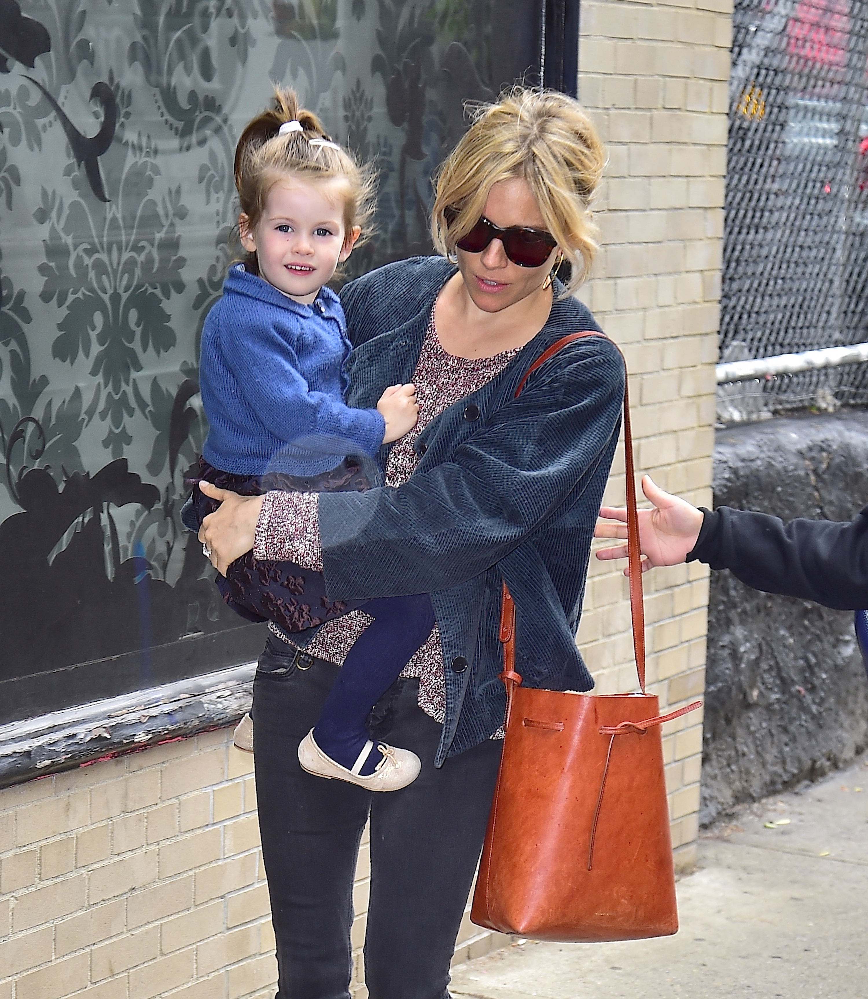 Sienna Miller and daughter Marlowe Ottoline Layng Sturridge are seen in Soho on June 2, 2015 in New York Cit | Source: Getty Images