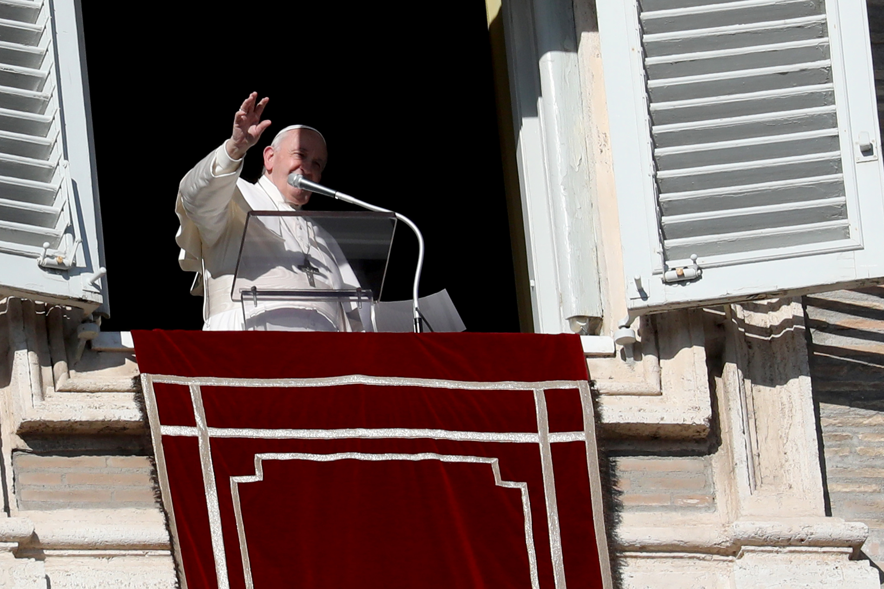 Pope Francis delivering his Angelus blessing from the window of his private studio to pilgrims gathered in St. Peter's Square on December 13, 2020, in Vatican City. | Source: Getty Images