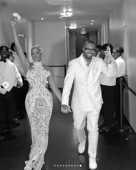 LeToya Luckett and Taleo Coles posing for a picture on their wedding day, posted on August 1, 2024 | Source: Instagram/letoyaluckett