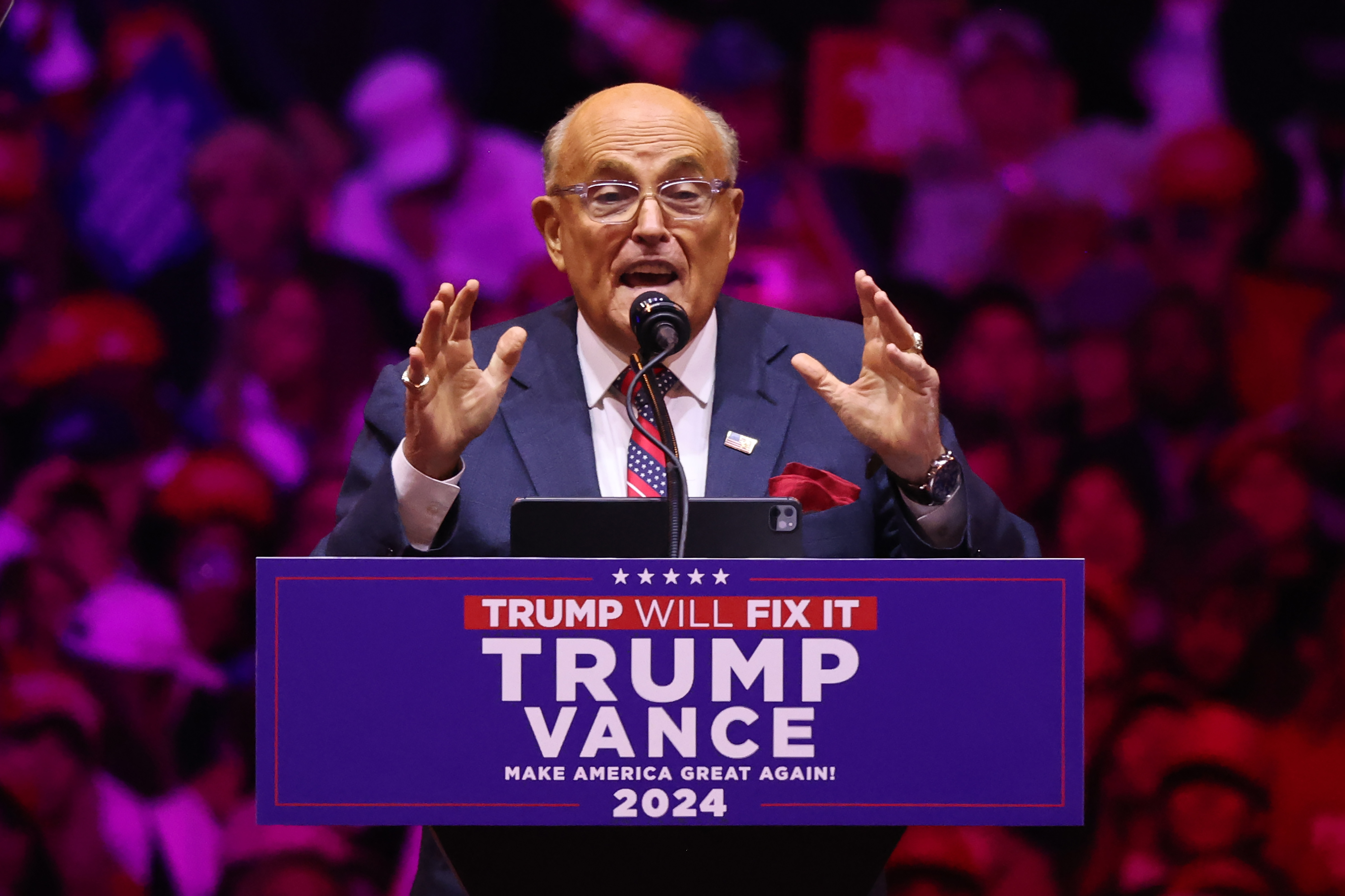 Rudy Giuliani speaks prior to Republican presidential nominee, Donald Trump, taking the stage at a campaign rally at Madison Square Garden on October 27, 2024. | Source: Getty Images
