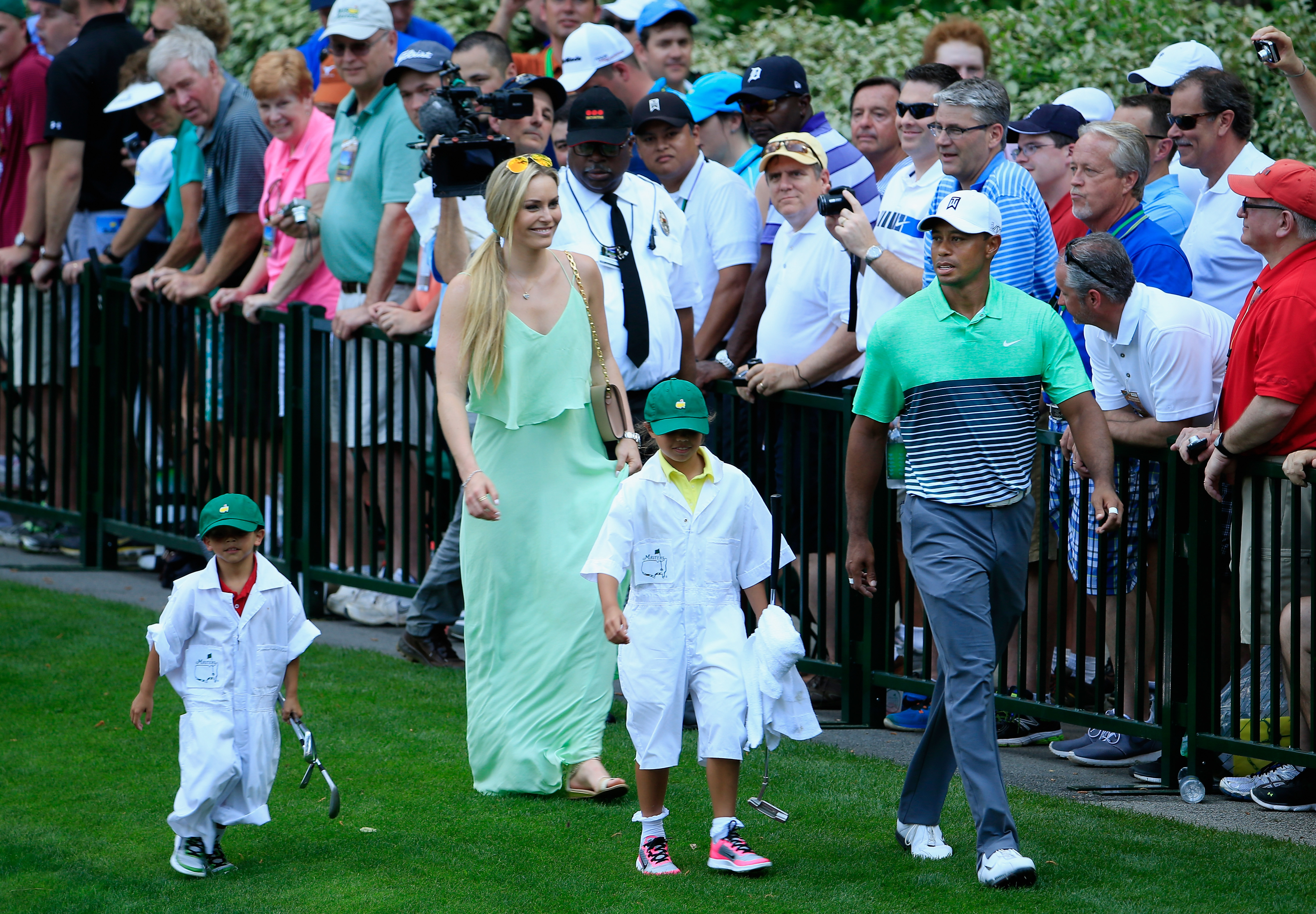 Tiger Woods with Lindsey Vonn, his son, Charlie, and daughter Sam during the Par 3 Contest at Augusta National Golf Club on April 8, 2015, in Georgia. | Source: Getty Images