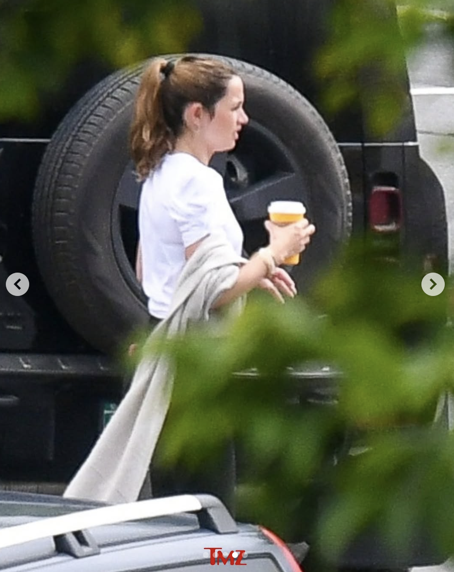 Ana de Armas holding a cup of coffee while out in Vermont with Tom Cruise, posted on July 29, 2025. | Source: Instagram/tmz