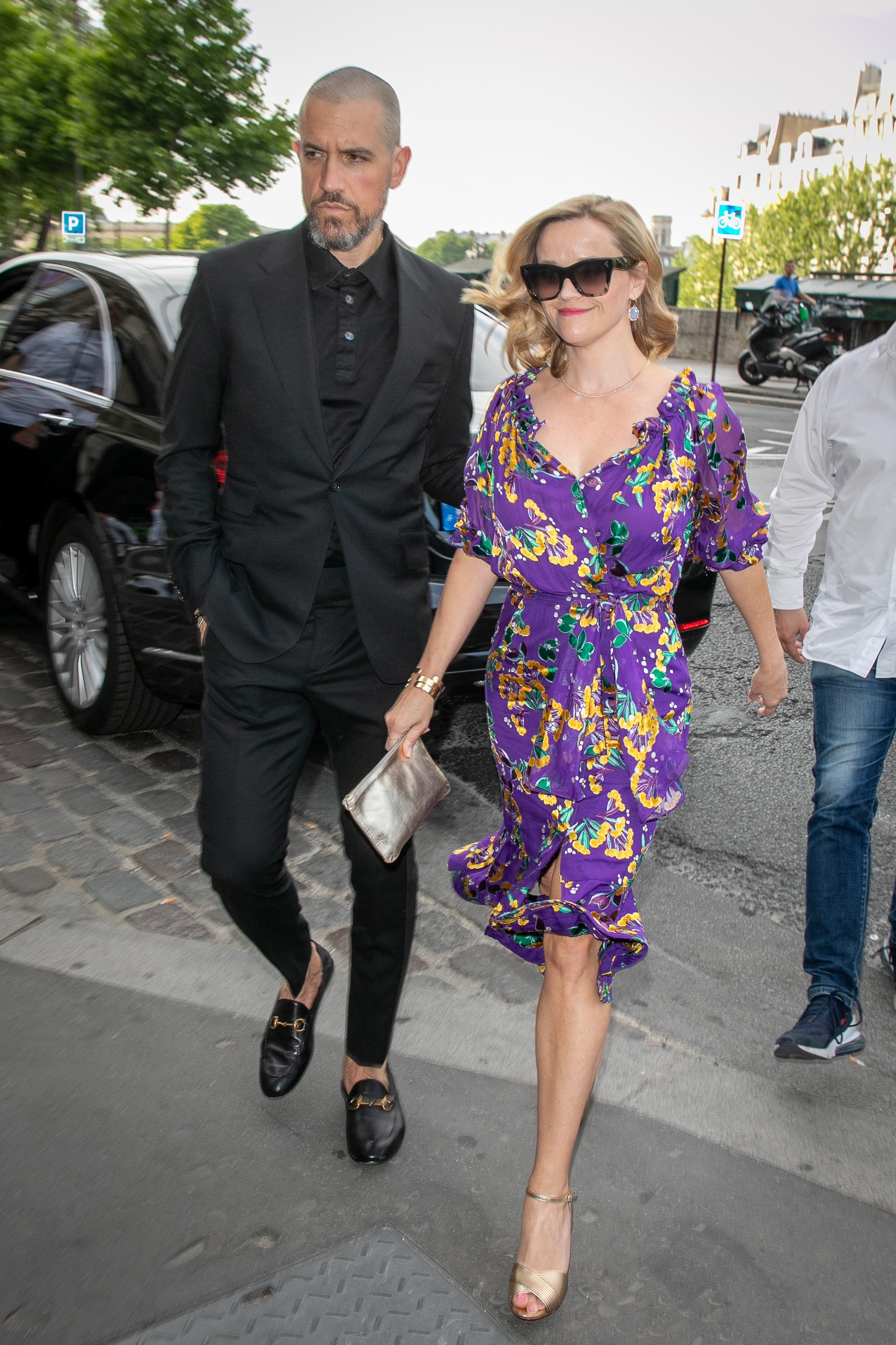 Jim Toth and actress Reese Witherspoon arrive at 'Laperouse' restaurant on June 28, 2019, in Paris, France. | Source: Getty Images