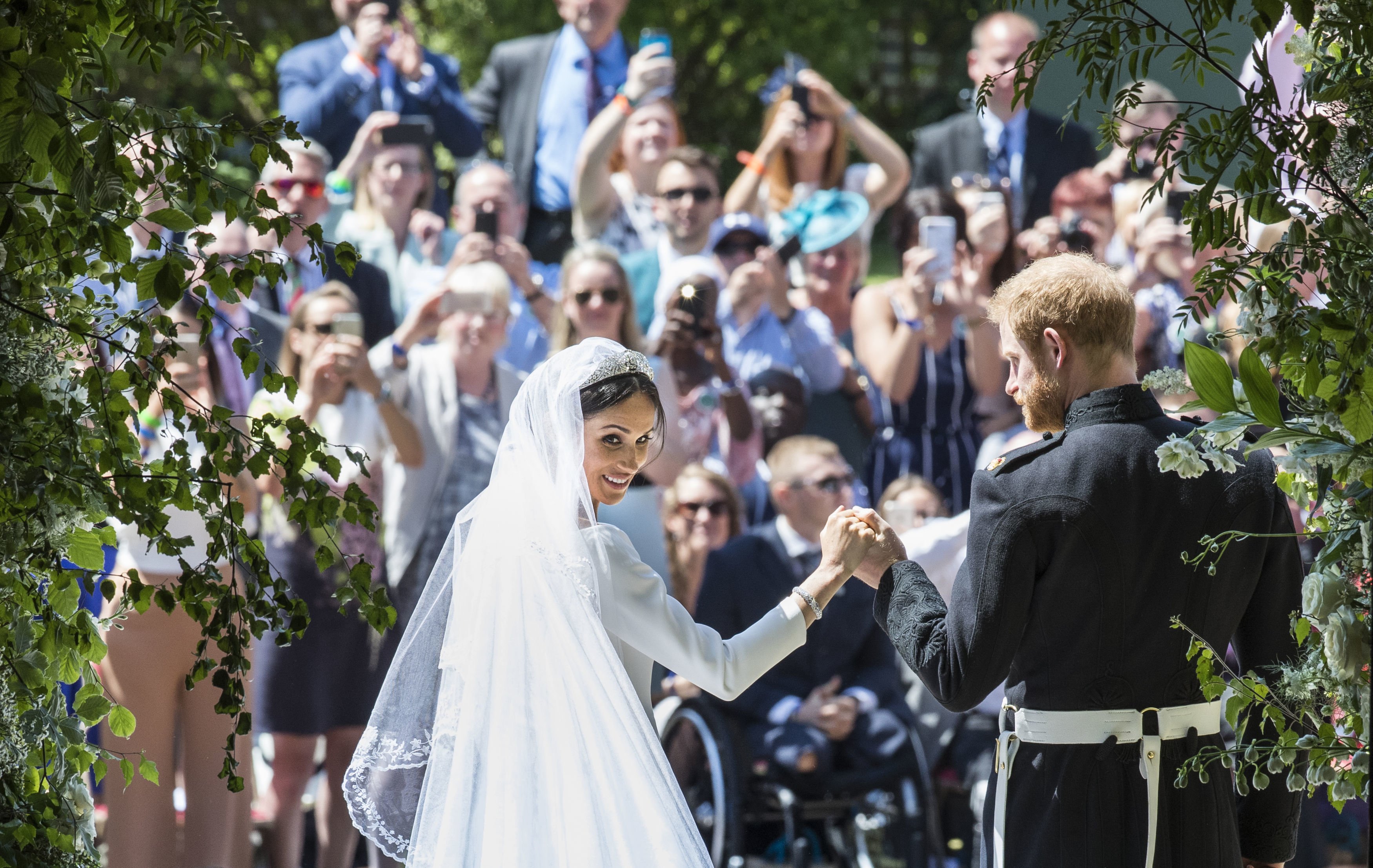The Duke and Duchess of Sussex outside Windsor Castle after their wedding ceremony in St George's Chapel on May 19, 2018 in Windsor, England. | Source: Getty Images 