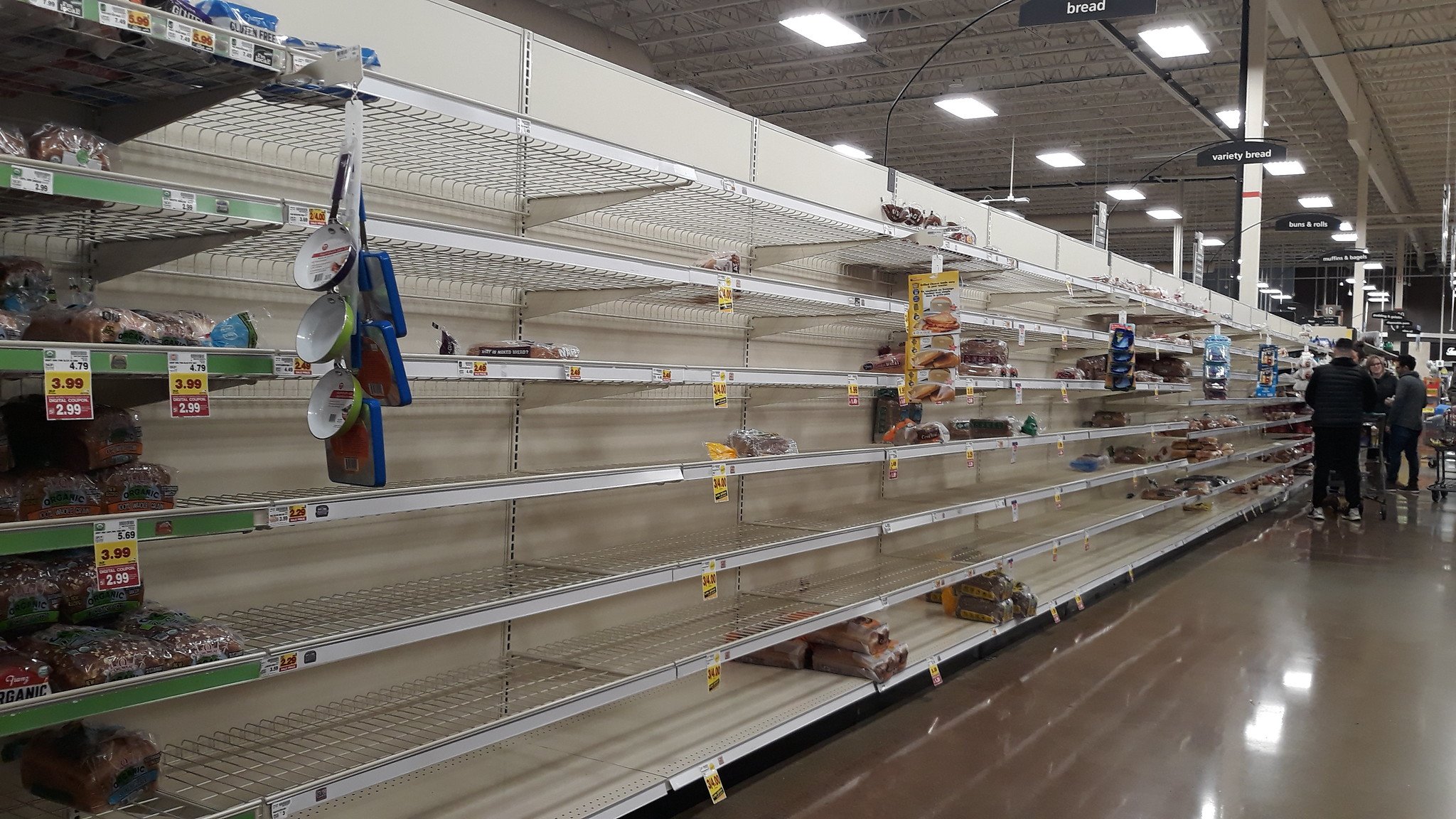 Covid-19 panic buying leaves shelves empty on March 12, 2020, in Washington, USA | Photo: Flickr/Wonderlane