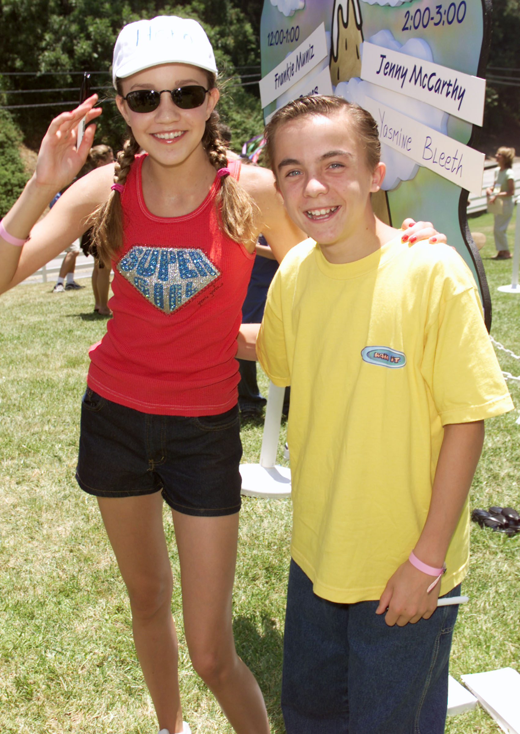 As a child, she experienced a rapid rise to fame in the entertainment industry. At this event, Amanda Bynes and Frankie Muniz posed at the 11th Annual Elizabeth Glaser Pediatric AIDS Foundation's A Time For Heroes carnival and picnic at Ken Robert's estate in Mandeville Canyon on June 4, 2000, in Los Angeles, California.