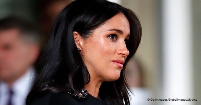 Meghan Markle Channels Pregnant Jacqueline Kennedy’s Look with a Silk Burgundy Coat