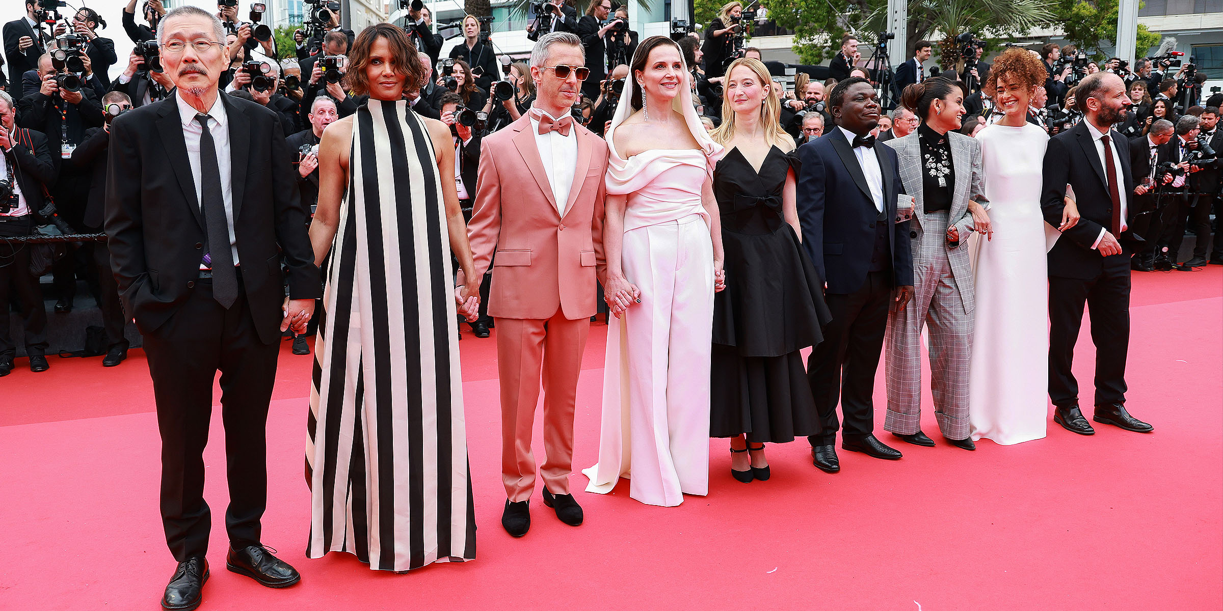 Hong Sang-soo, Halle Berry, Jeremy Strong, Juliette Binoche, Alba Rohrwacher, Dieudo Hamadi, Payal Kapadia, Leïla Slimani, and Carlos Reygadas | Source: Getty Images