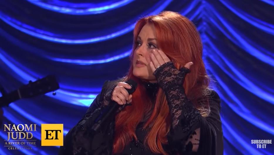 Wynonna Judd cries at the memory of her mother Naomi Judd from a video dated May 16, 2022 | Source: youtube.com/@EntertainmentTonight