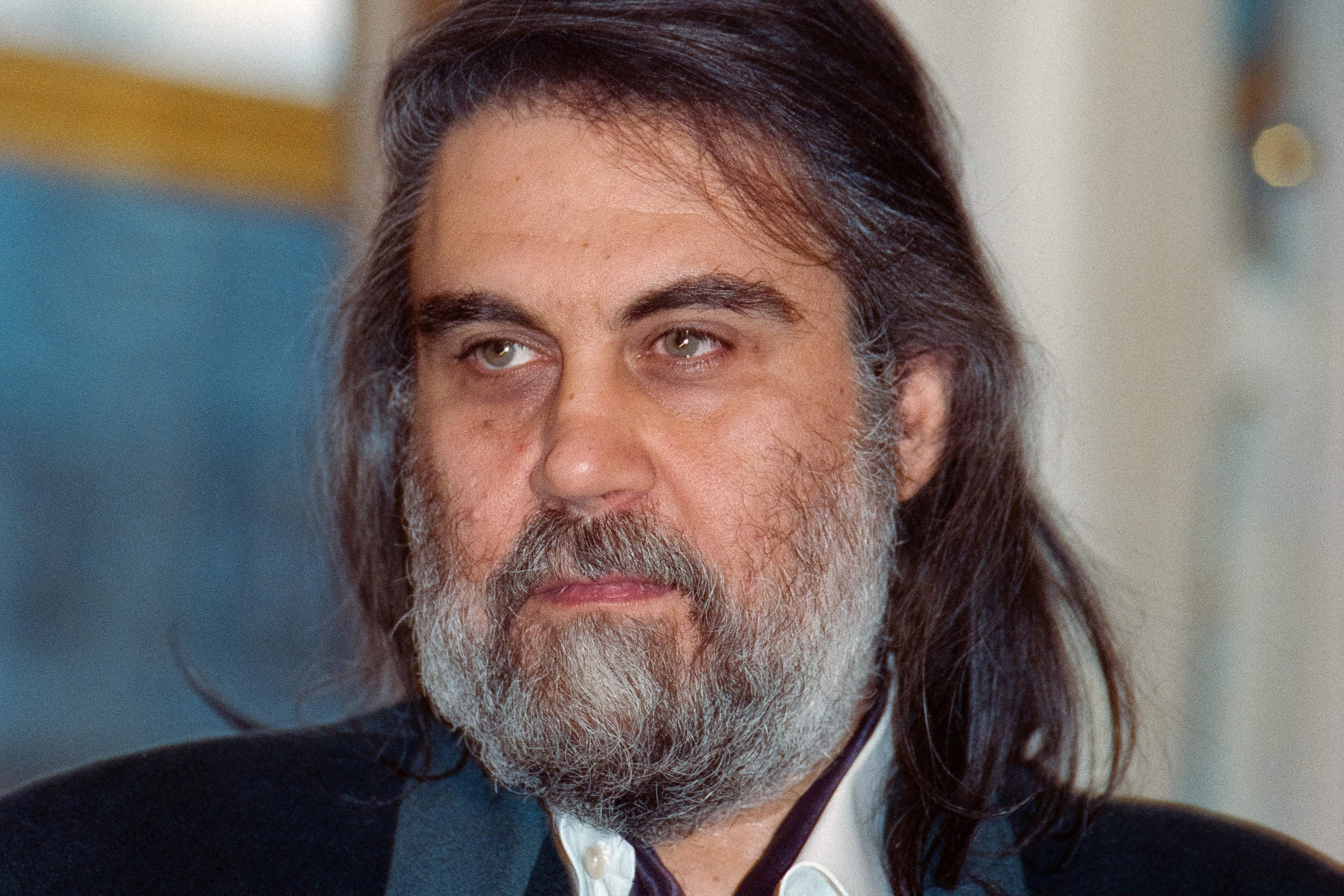 Greek musician and composer, Vangelis Papathanassiou, (Vangelis) at the French Culture Ministry after receiving a decoration, October 20, 1992  | Source: Getty Images