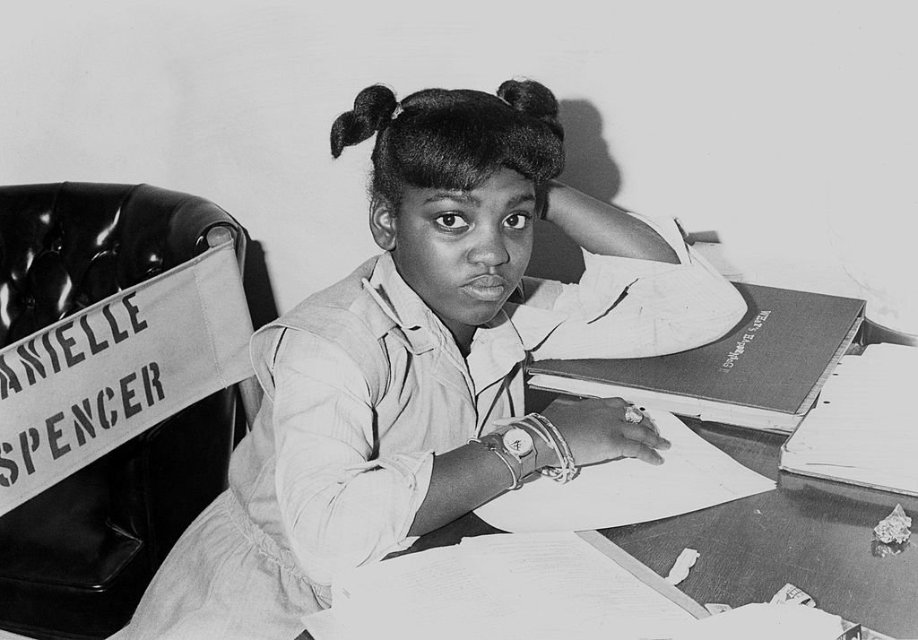 Actress Danielle Spencer from the TV show 'What's Happening!!' does her school work on her dressing room circa 1977. | Photo: Getty Images