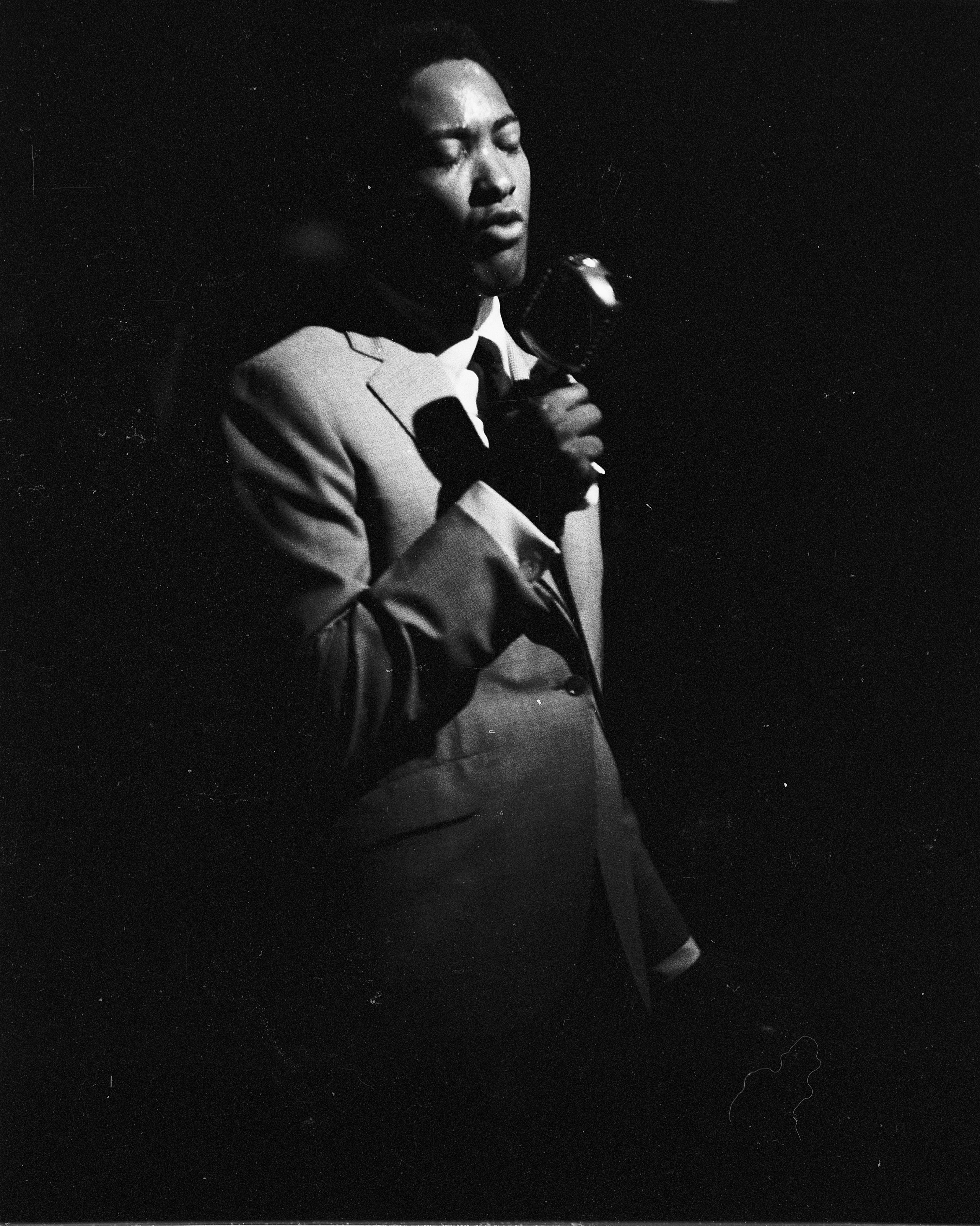 Sam Cooke (1931 – 1964), singer, songwriter and civil-rights activist, on stage with band at New York's Copacabana nightclub in June 1964. | Source: Getty Images