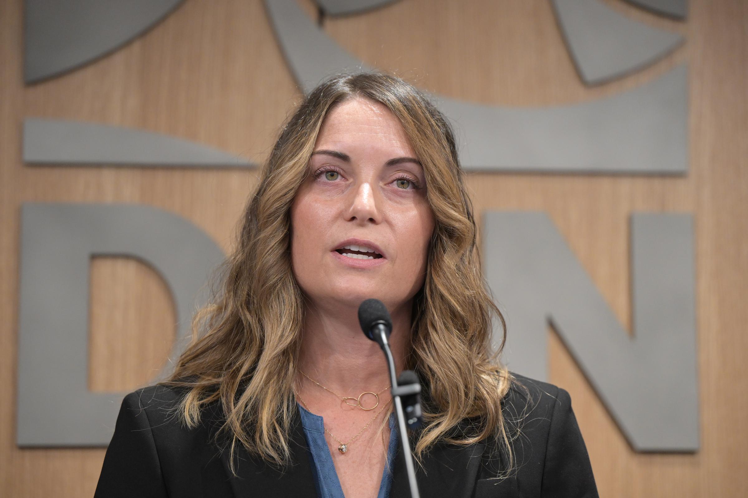 Denver Chief Medical Examiner Dr. Sterling McLaren speaks during a press conference at Denver International Airport on May 12, 2026, in Denver, Colorado | Source: Getty Images