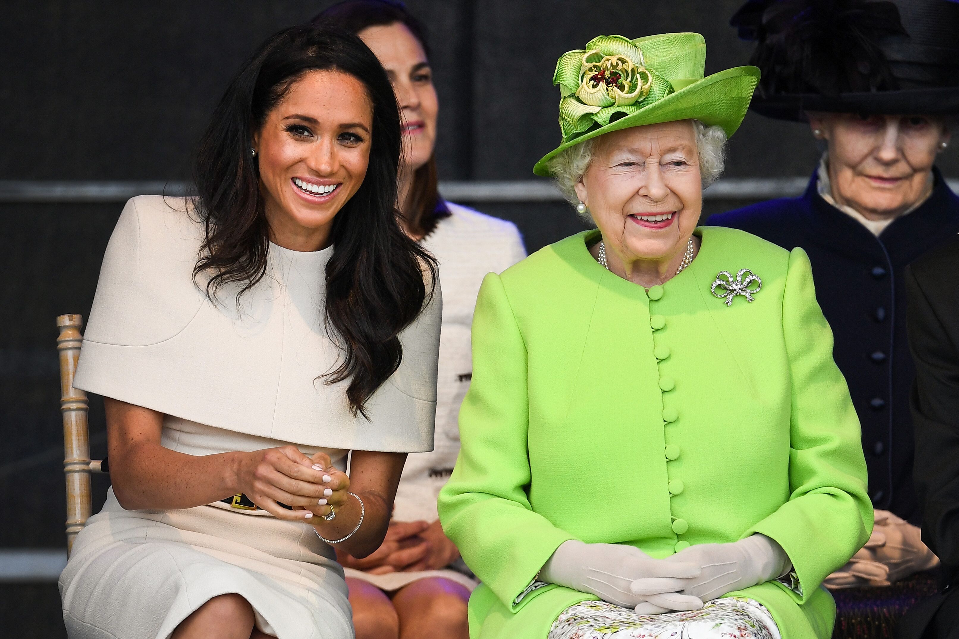 Queen Elizabeth II sits with Meghan, Duchess of Sussex during a ceremony to open the new Mersey Gateway Bridge on June 14, 2018 | Photo: Getty Images