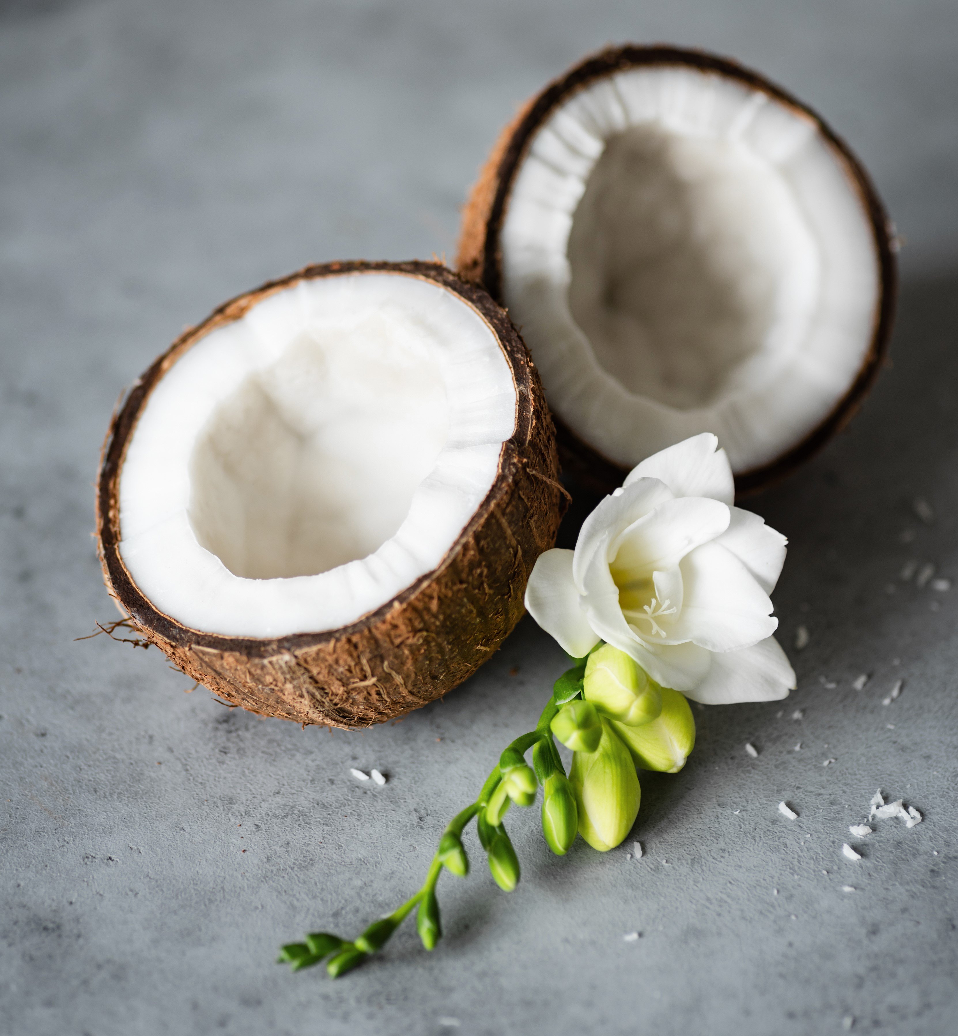 Coconut and flowers. | Source: Getty Images