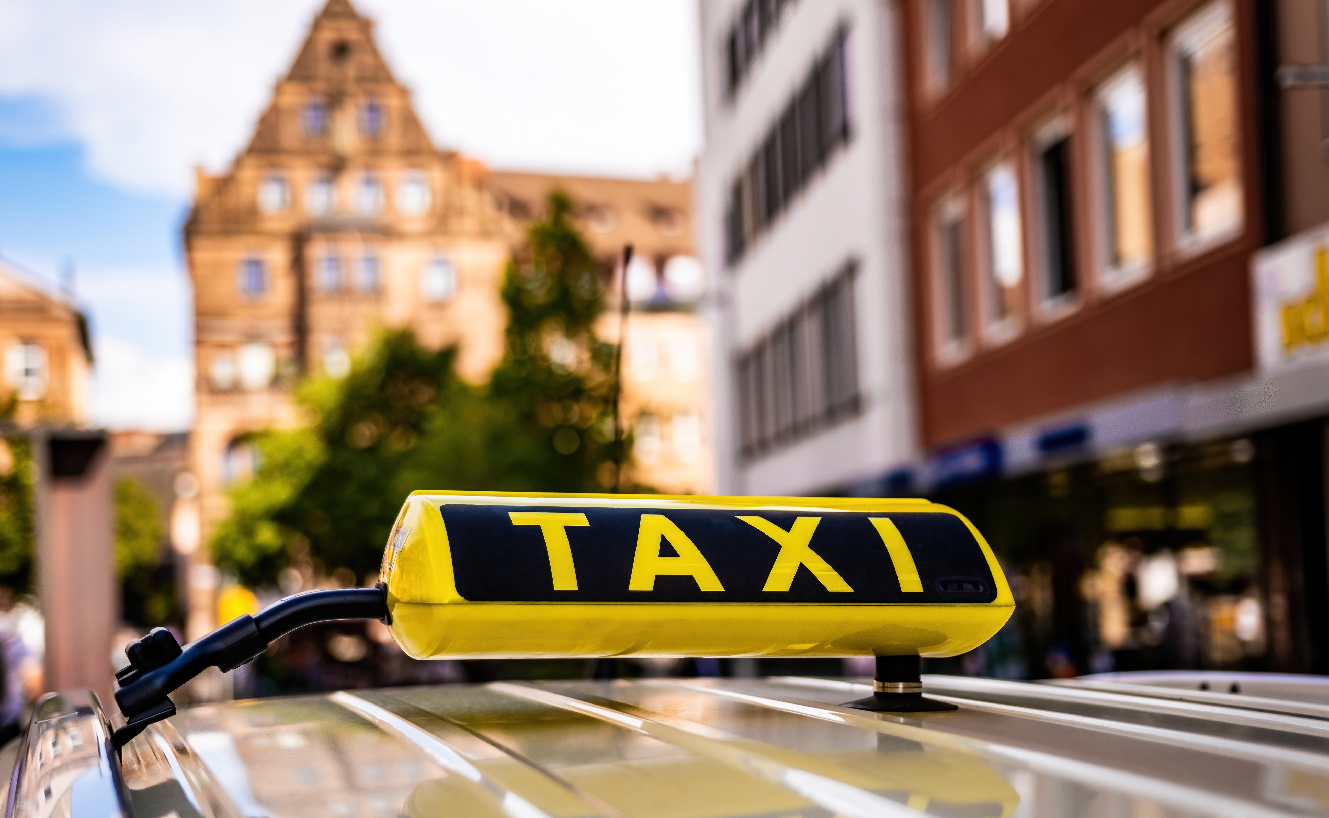 Yellow taxi sign. | Source: Shutterstock