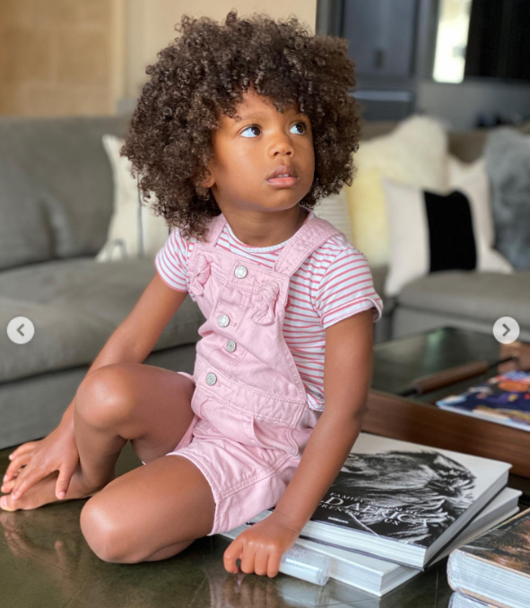 Ciara's daughter Sienna Wilson sitting on a coffee table for her birthday on April 28, 2020 | Source: Instagram/ciara