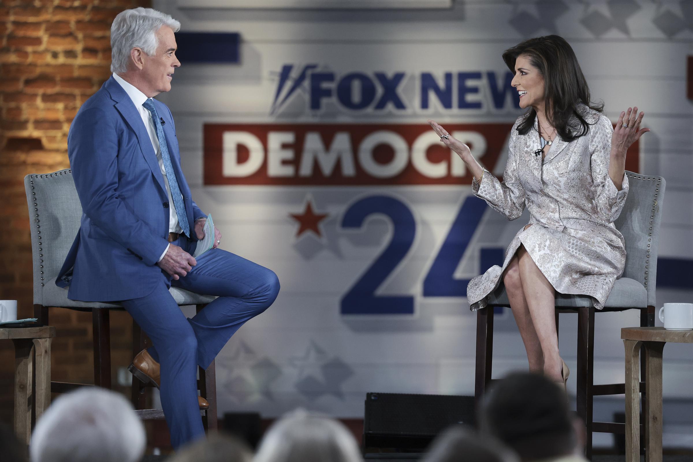 John Roberts and Nikki Haley during a Fox News "Democracy 2024: South Carolina Town Hall" event on February 18 in Columbia. | Source: Getty Images