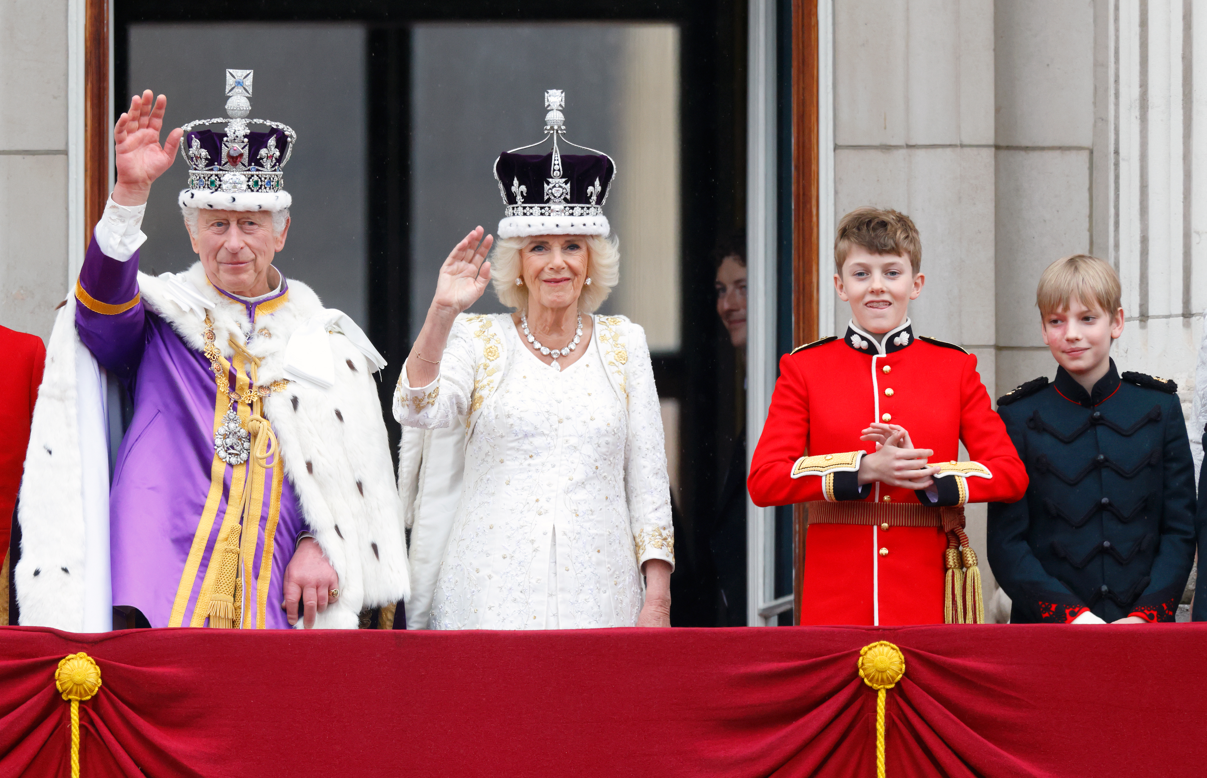 King Charles III, Queen Camilla, Freddy Parker Bowles, and Gus Lopes at the Buckingham Palace after the Coronation service in London, England, on May 6, 2023. | Source: Getty Images