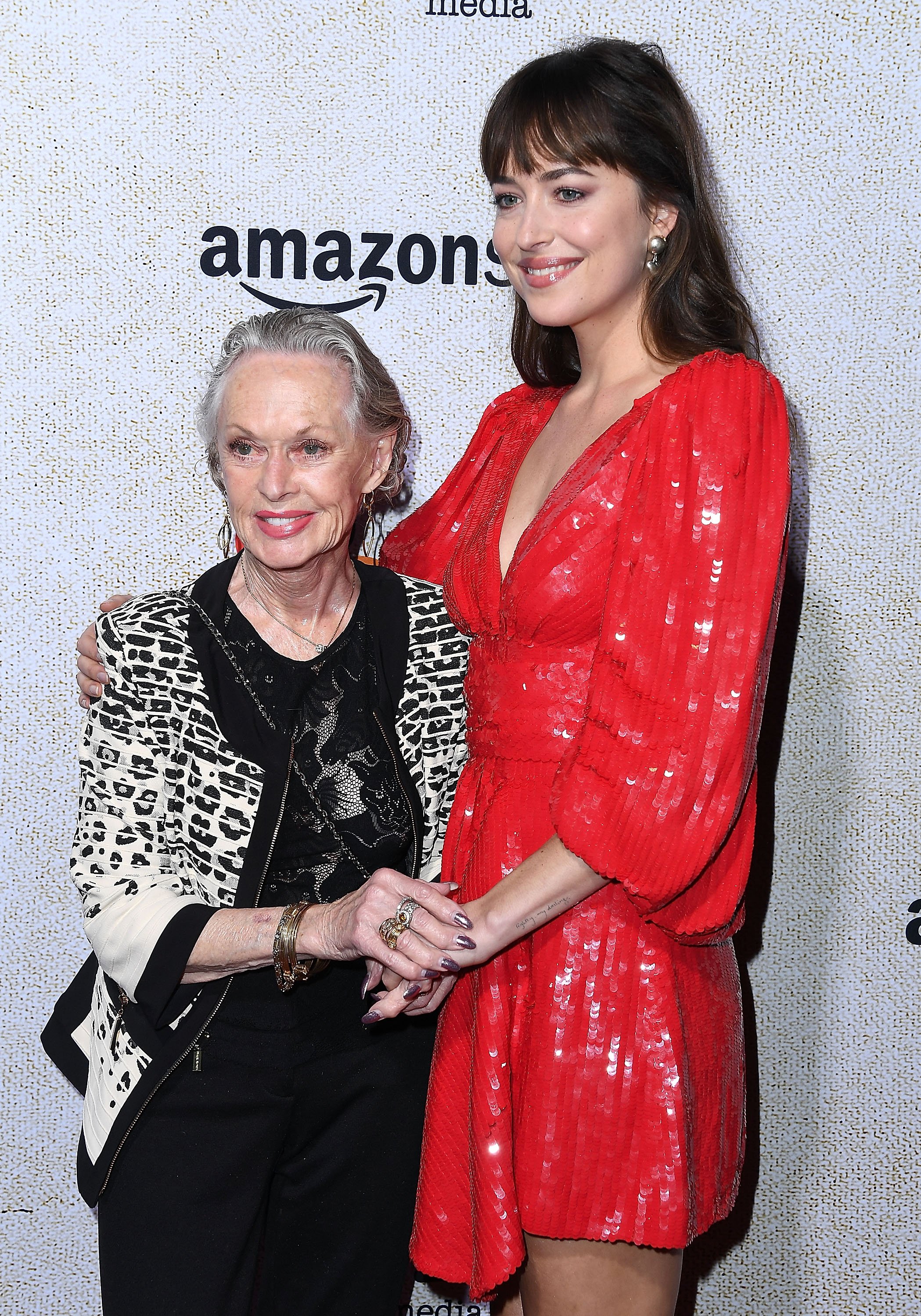 Tippi Hedren, Dakota Johnson arrives at the Premiere Of Amazon Studios' "Suspiria" at ArcLight Cinerama Dome on October 24, 2018 in Hollywood, California | Source: Getty Images 