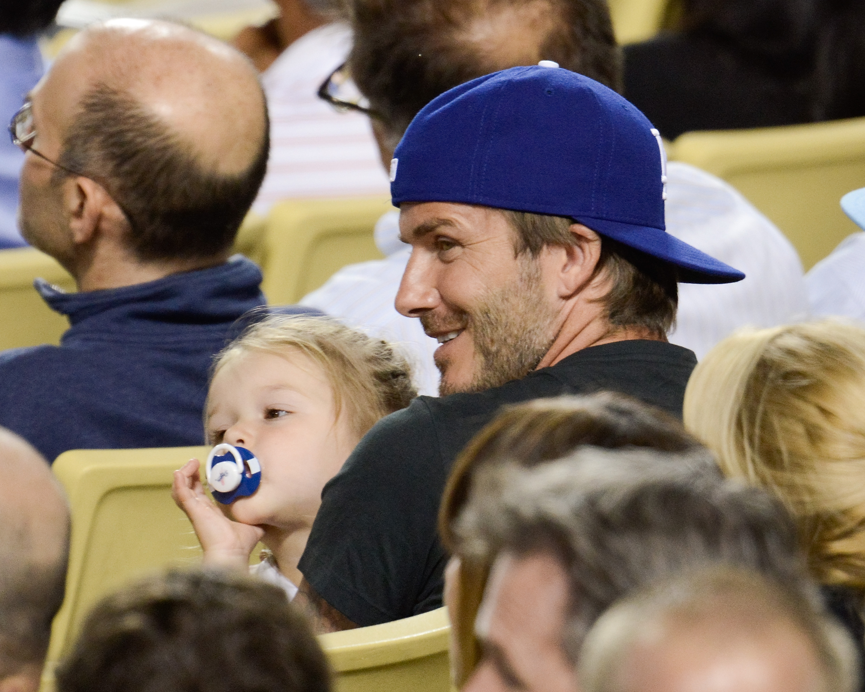 Harper and David Beckham at a Los Angeles Dodgers Game in 2013 | Source: Getty Images