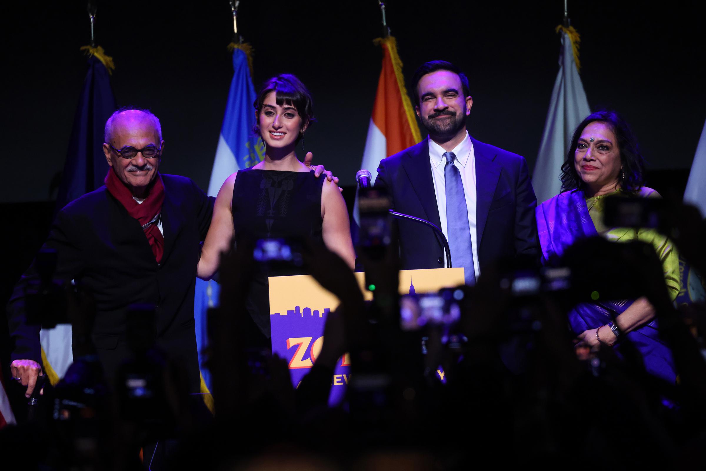 New York City Democratic mayoral candidate Zohran Mamdani (2nd-R) stands with his wife Rama Duwaji (2nd-L) alongside his parents Mahmood Mamdani (L) and Mira Nair (R) on November 4, 2025. | Source: Getty Images