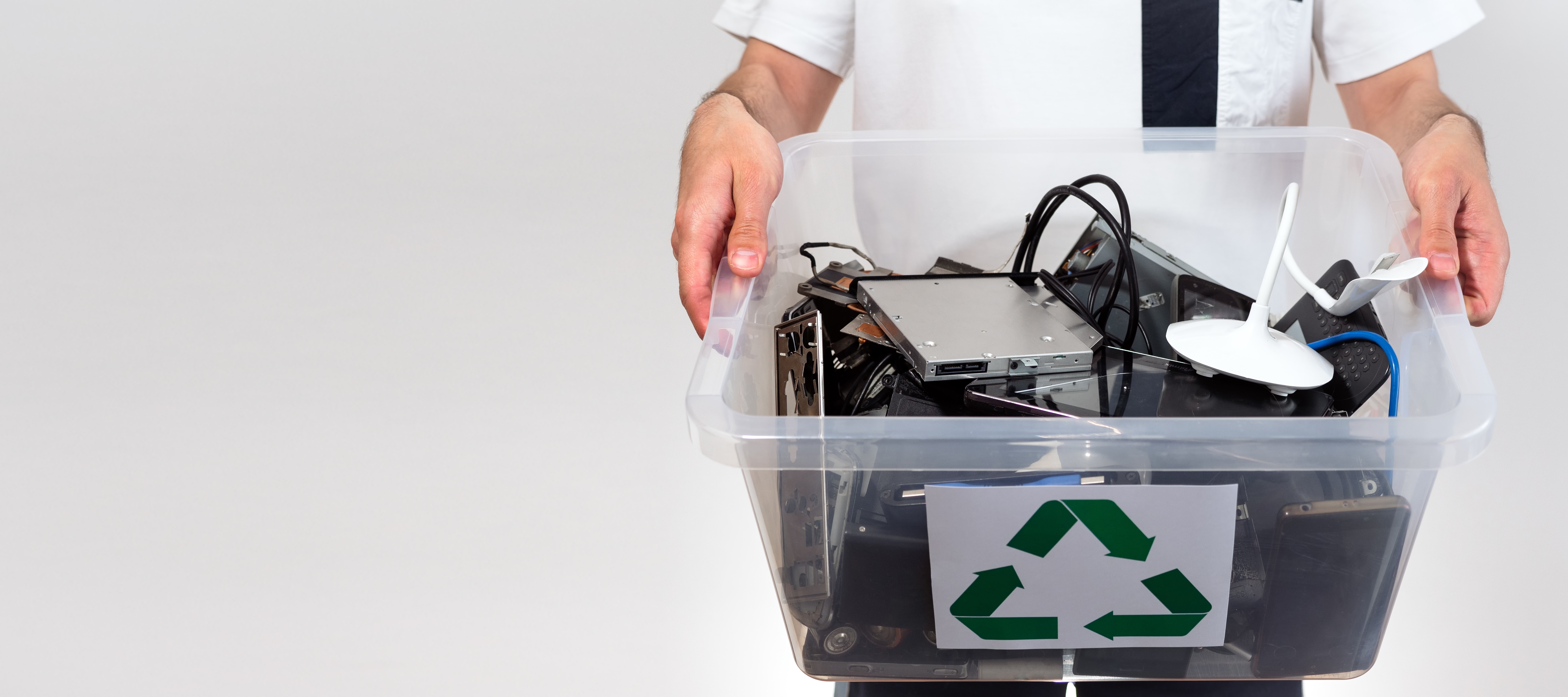 Household electrical and scrapped electronic devices in recycle box | Source: Shutterstock