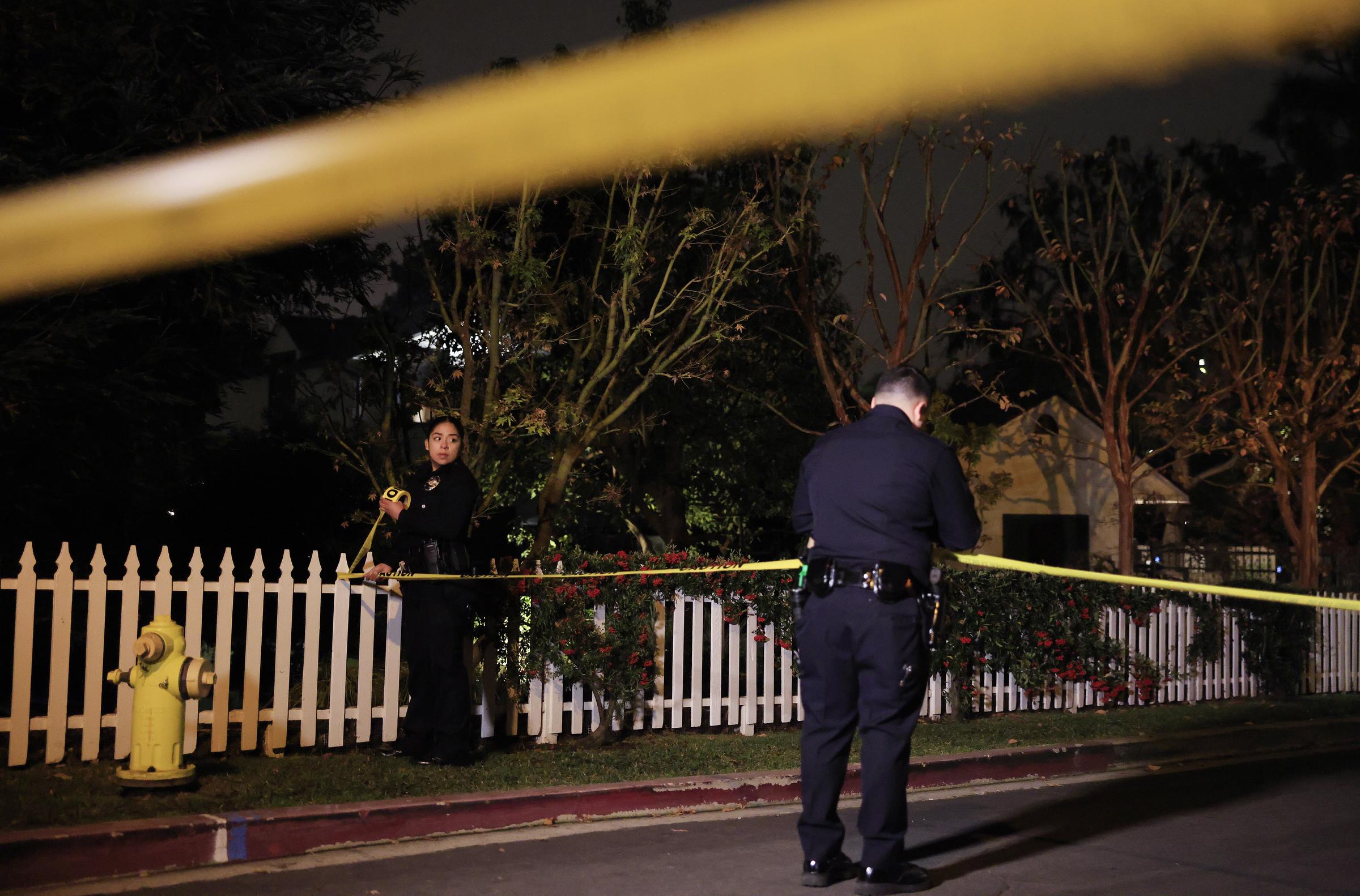 Los Angeles Police Department officers outside Rob and Michele Reiner's Brentwood home in Los Angeles on December 14, 2025 | Source: Getty Images