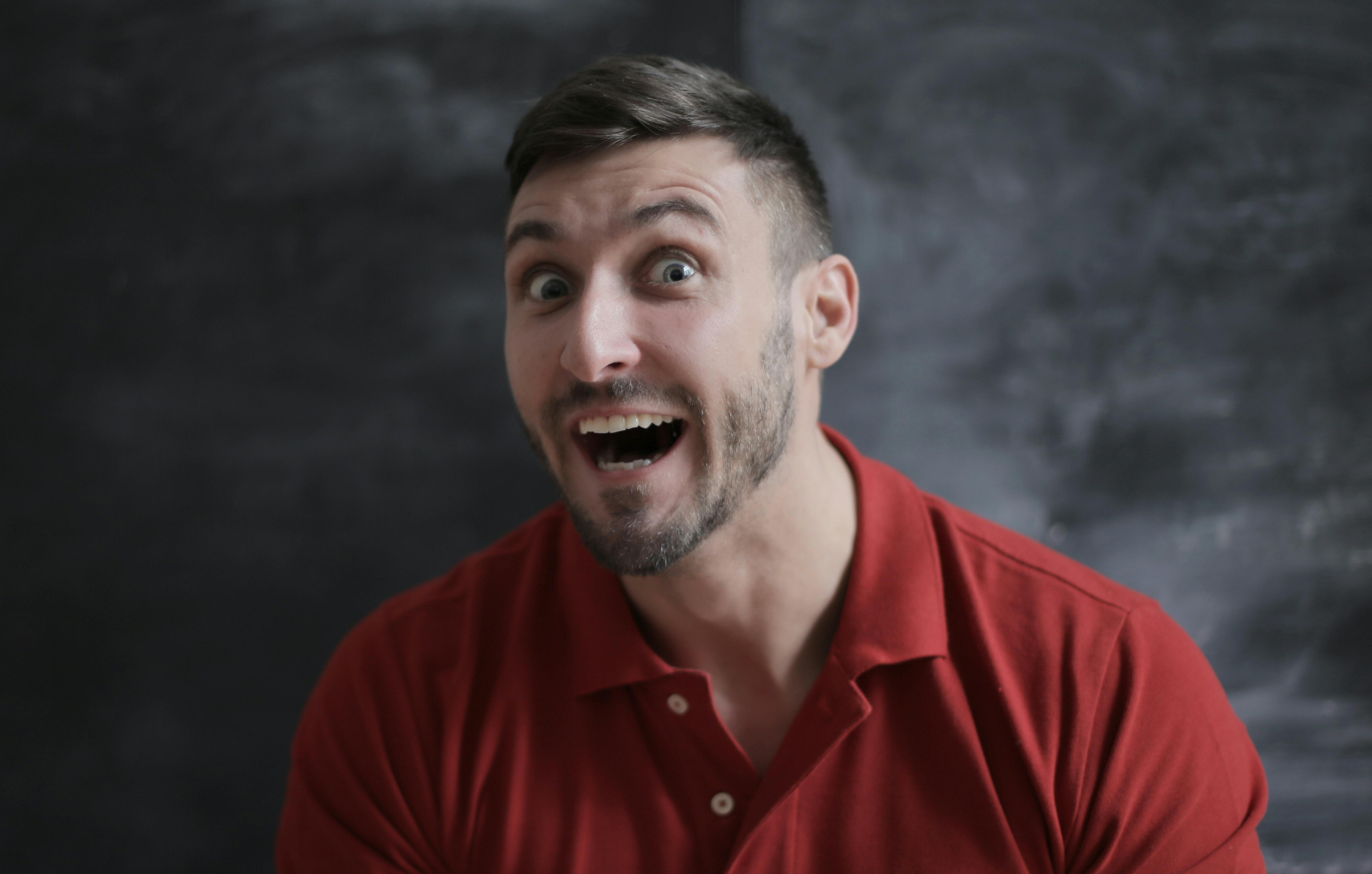A man laughing awkwardly | Source: Pexels