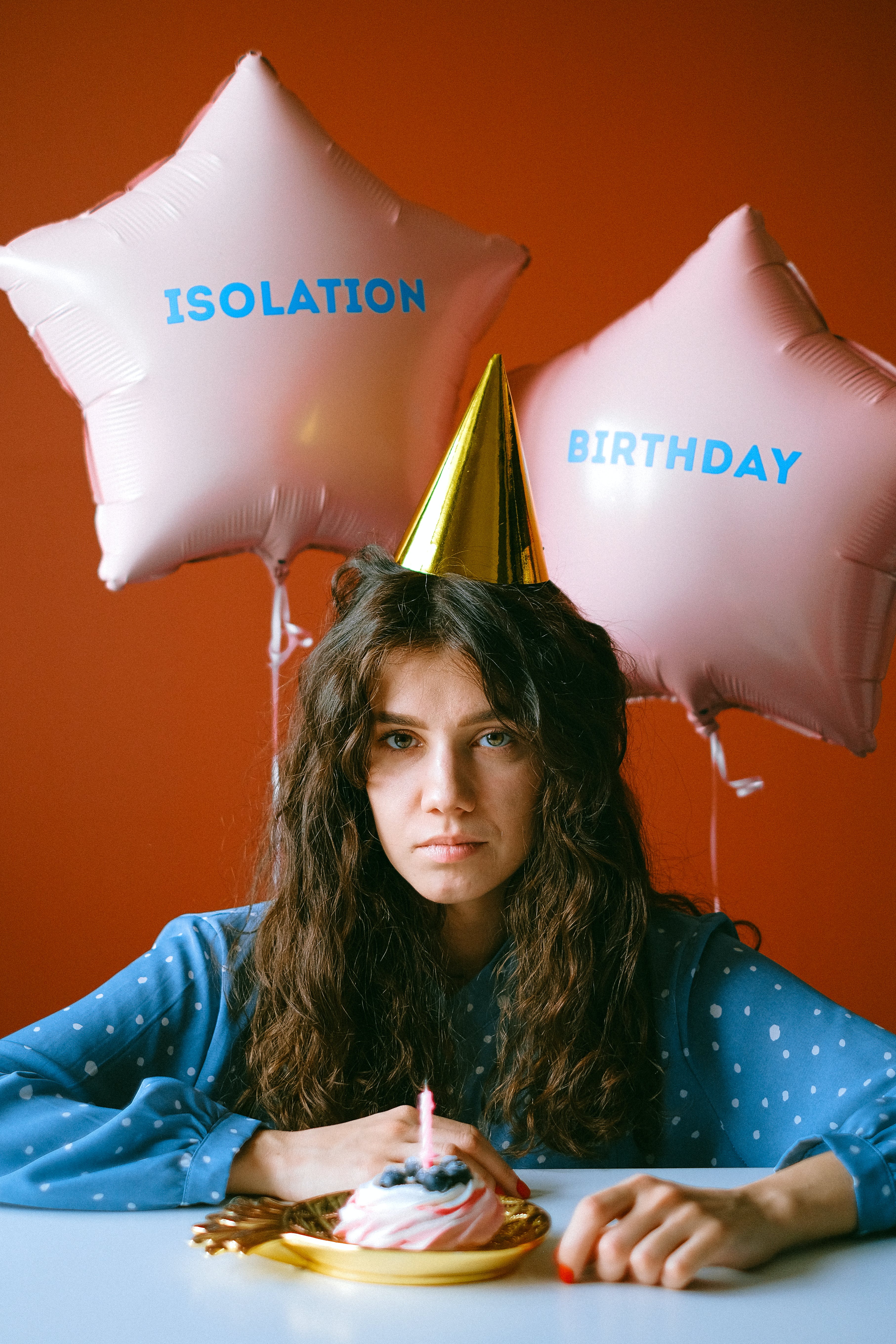 An unhappy woman celebrating her birthday. | Source: Pexels