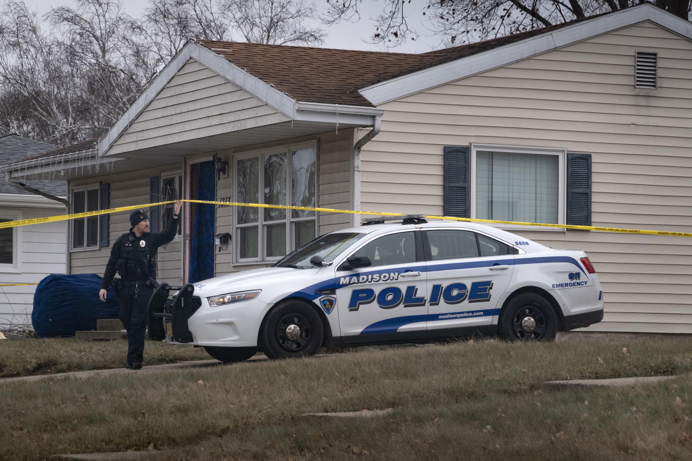 A policeman outside of Natalie "Samantha" Rupnow's home in Madison, Wisconsin on December 17, 2024 | Source: Getty Images