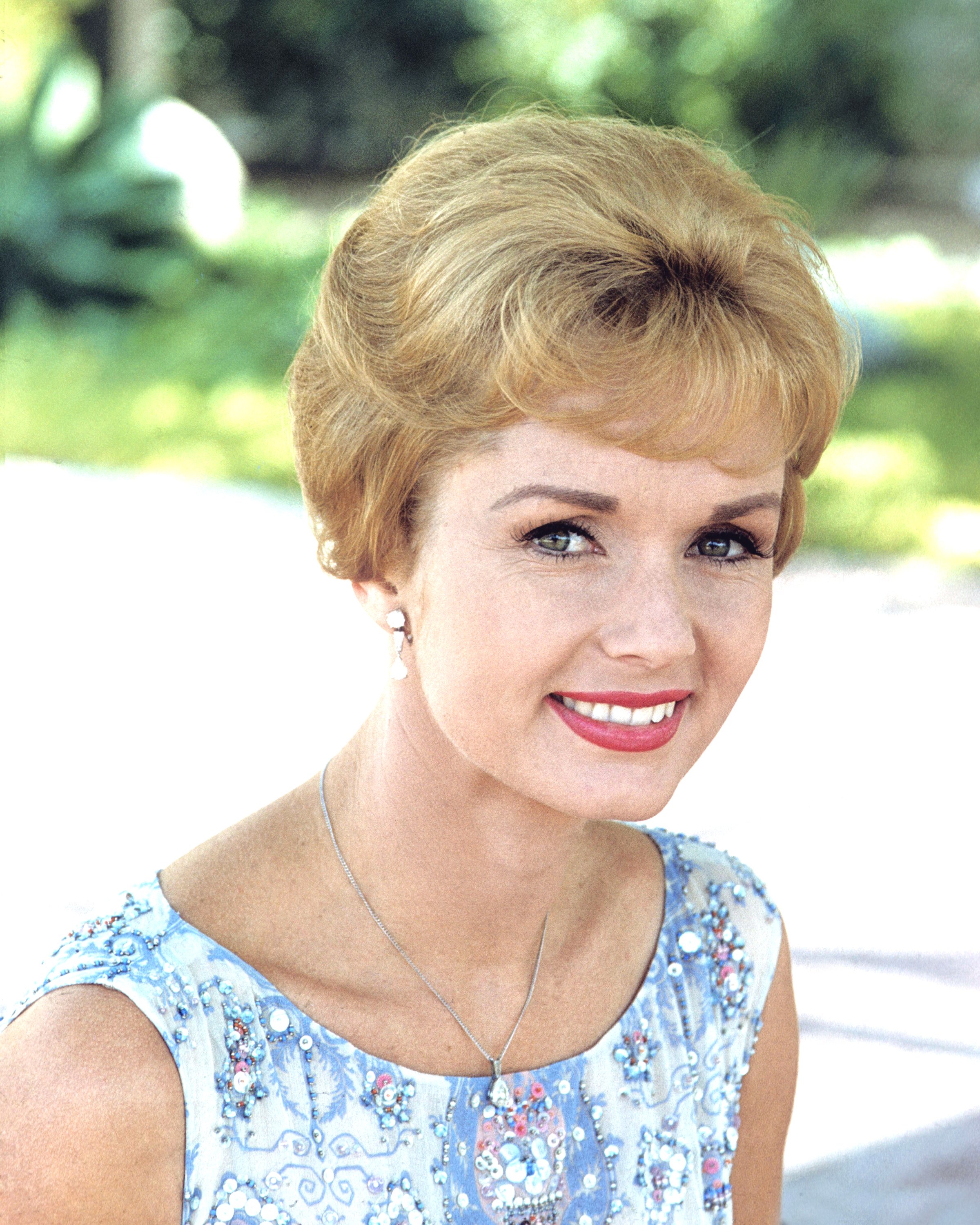 Actress Debbie Reynolds pictured wearing a blue and white print pattern sleeveless top on January 1, 1970 ┃Source: Getty Images