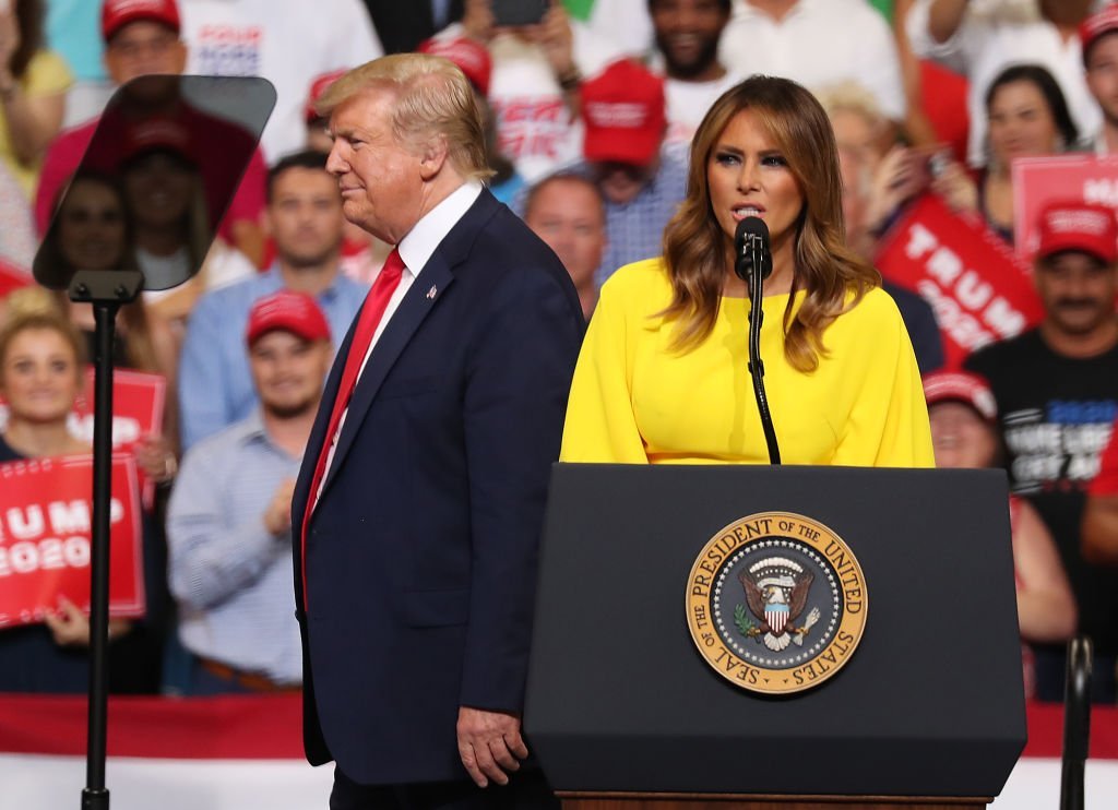 President Donald Trump and First Lady Melania Trump arrive on stage as President Trump prepares to announce his candidacy for a second presidential term at the Amway Center | Photo: Getty Images