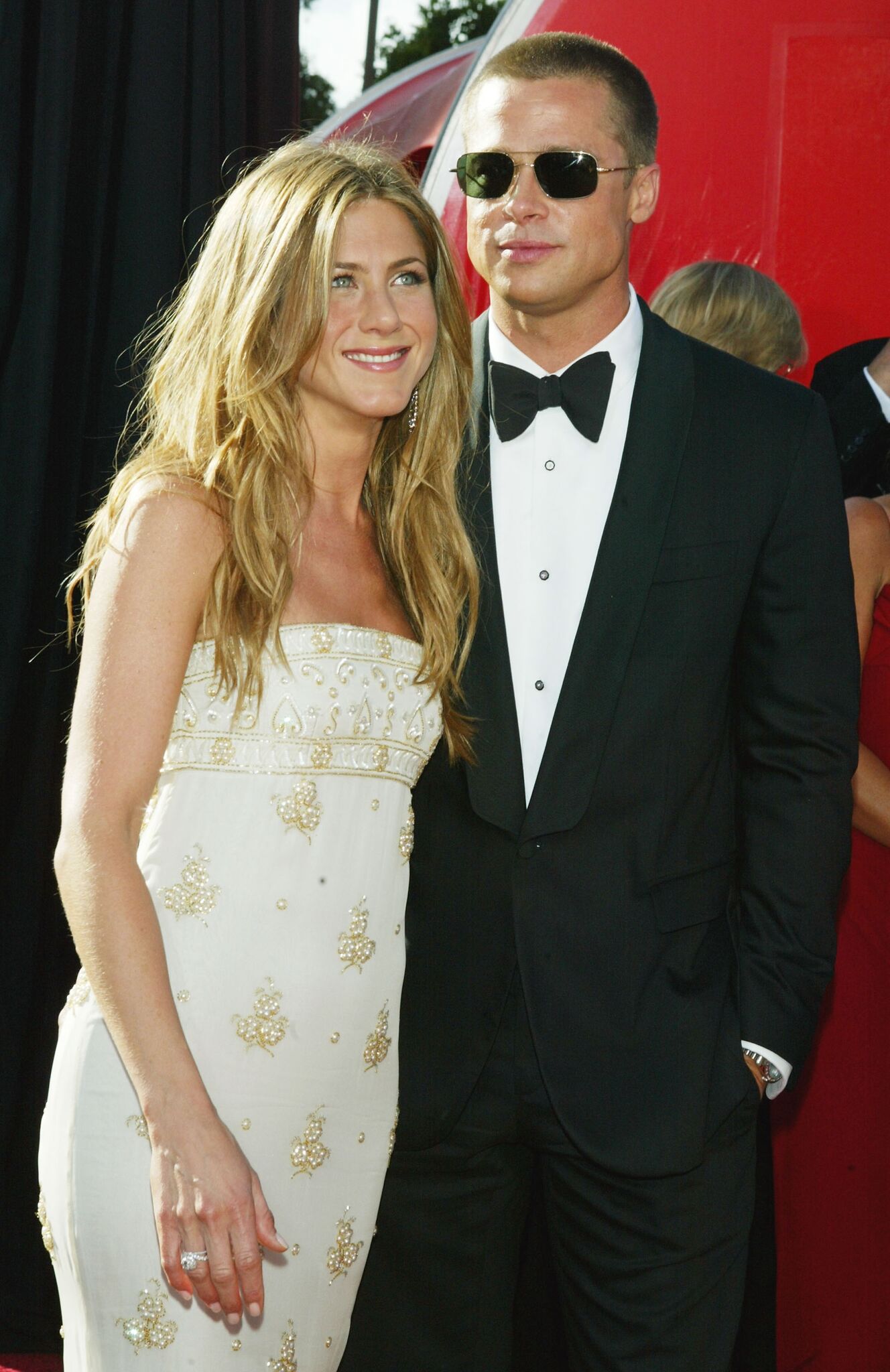 Actors Jennifer Aniston and husband Brad Pitt attend the 56th Annual Primetime Emmy Awards at the Shrine Auditorium | Getty Images