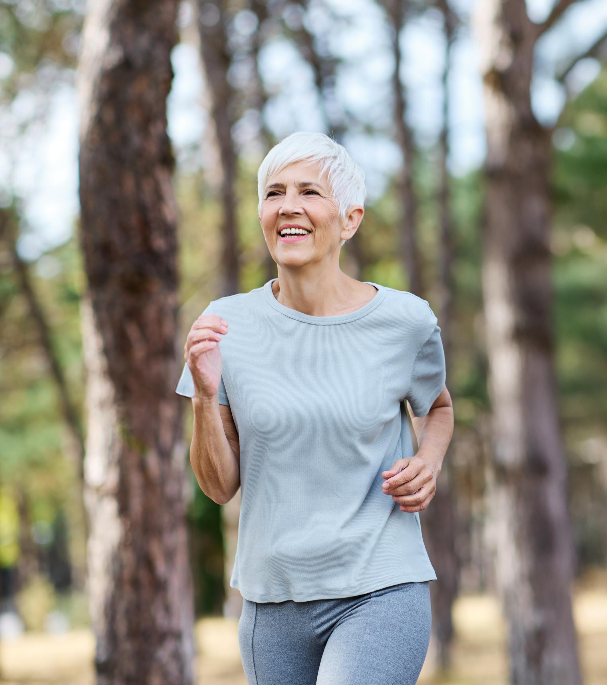 Woman jogging outdoors | Source: Shutterstock