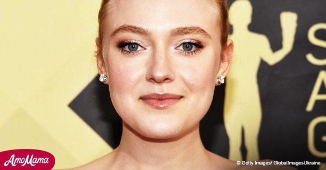 Dakota Fanning proudly put her fantastic figure on display in crop top and trousers combo