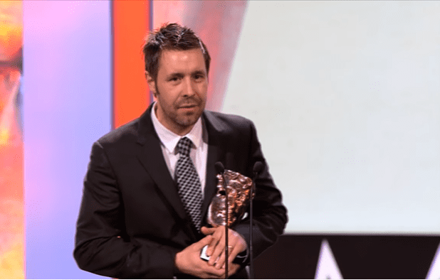 Paddy Considine winning the BAFTA for Outstanding Debut by a British Writer, Director or Producer for "Tyrannosaur" in February 2012 | Source: YouTube/BAFTA