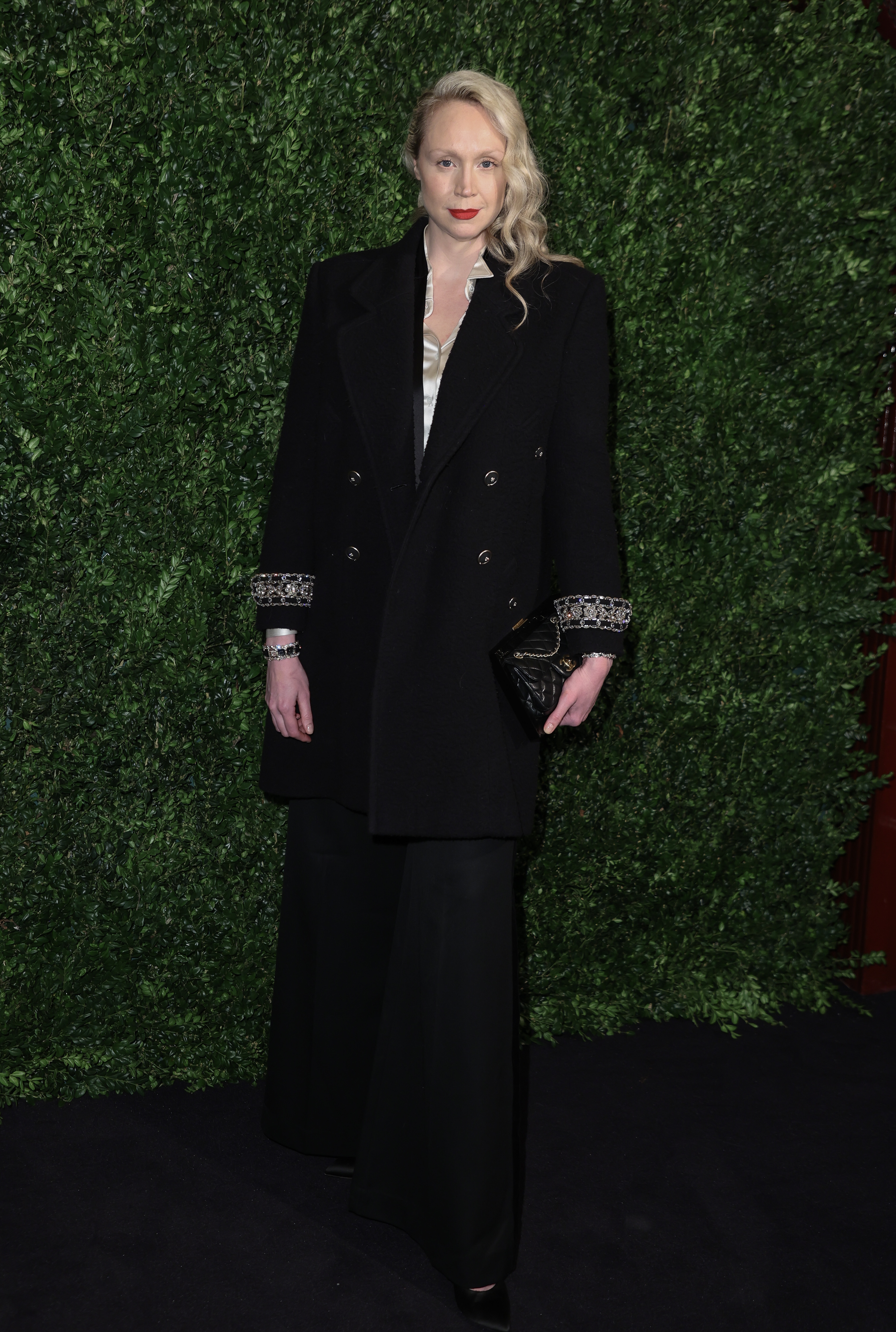 Gwendoline Christie at the Charles Finch x CHANEL Pre-BAFTA Dinner on February 18, 2023, in London, England. | Source: Getty Images