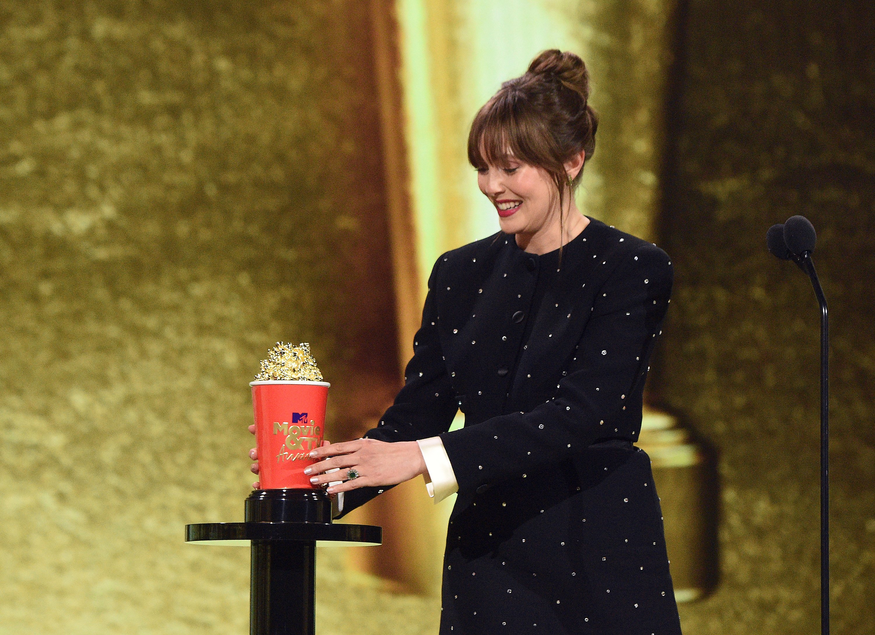 Elizabeth Olsen accepts the Best Fight award for 'WandaVision' onstage during the 2021 MTV Movie & TV Awards at the Hollywood Palladium on May 16, 2021 in Los Angeles, California. | Source: Getty Images